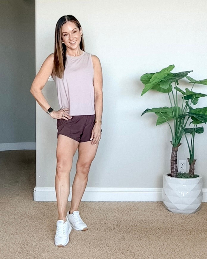 Favorite workout outfit from Amazon- designer inspired. Shorts are similar to the Lulu Hotty Hots  
wearing size XS iced iris tank, taupe running shorts XS TTS, sports bra size small. Shoes go up a size. Activewear, workout clothes, at home workout, running shorts, tank top, fitness, workout wear #women's #fashion #activ


#LTKPetite #LTKActive #LTKOver40