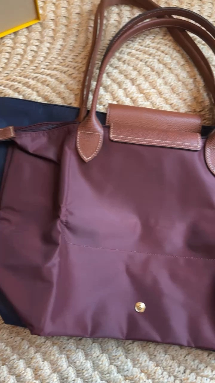 I ordered the burgundy Longchamp purse and then got a navy Amazon lookalike to compare! Thankfully the Longchamp version is a decent price for a high-end bag, but the Amazon one does work well for a budget pick. 

#LTKFindsUnder100 #LTKItBag #LTKStyleTip