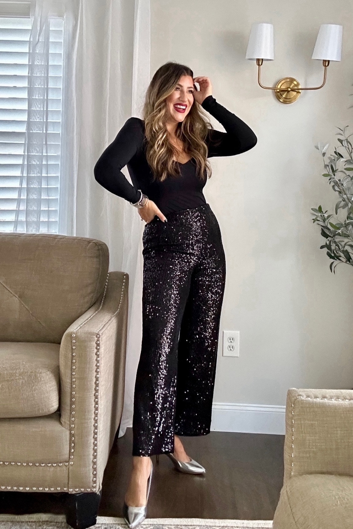 The perfect holiday outfit: black sparkly sequin pants, comfy skims inspired bodysuit from Amazon, silver pumps and a red lip. 🖤🪩 💄Wearing TTS in all! Holiday party outfit, work office outfit, holiday style. Linked a few other options in pants too!

Tap photos below to shop and follow for more! Xx

#LTKHoliday #LTKSeasonal #LTKstyletip
