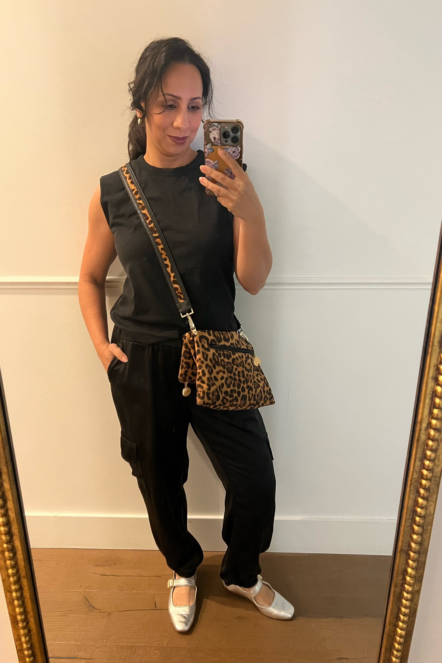 New Year's Eve outfit inspo. Satin joggers, a structured t-shirt, and silver mary Jane flats. 

#leopardprintpurse #satinjoggers 

#LTKStyleTip #LTKShoeCrush #LTKOver40