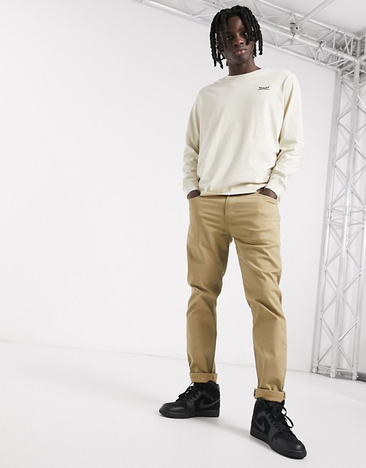 Levi's – Youth – Leger geschnittenes, langärmliges Oberteil mit kleinem Logo in Nebelbeige | ASOS DE