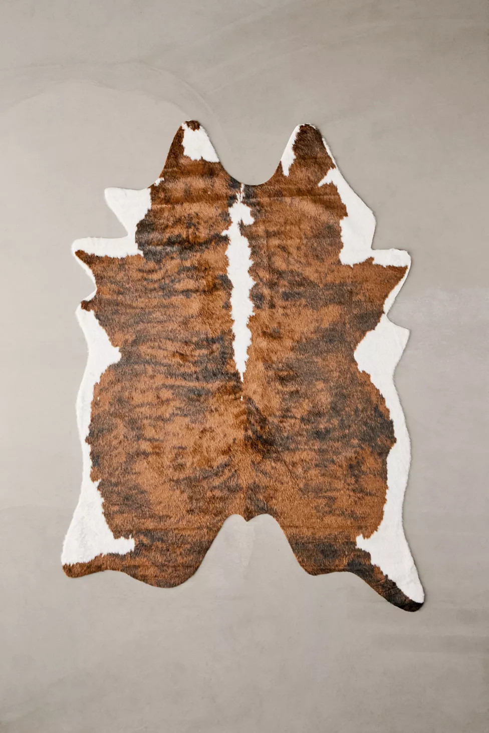 Shaped Faux Animal Hide Rug | Urban Outfitters (US and RoW)