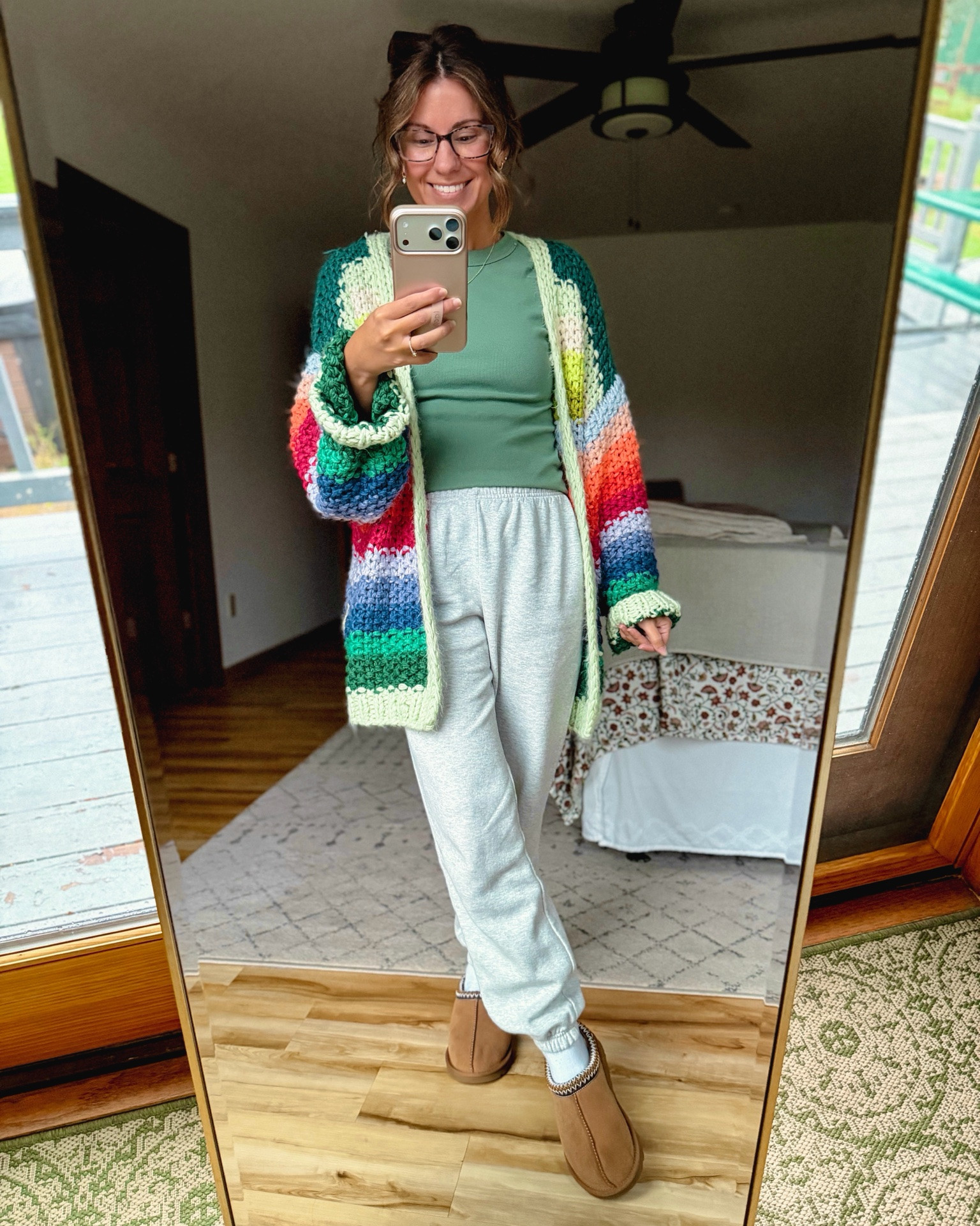 Dopamine dressing on this dreary and rainy day🌈 

small in my tee, small in my rainbow cardigan, xs in my grey sweatpants, and 6 in my Ugg Tasmans!