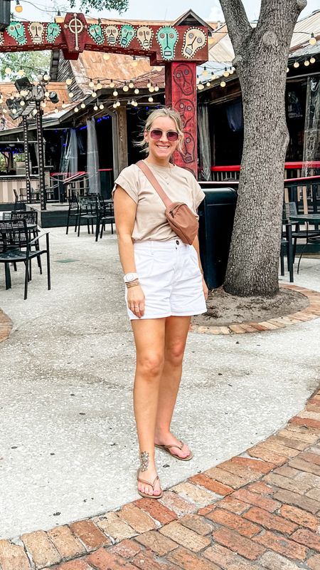 This look was day 2! We walked all around Epcot, different resort properties and Disney Springs (as well as Magic Kingdom through the monsoon!) I did dinner in this too at a steak house in the Contemporary. Medium tee but a small would definitely be better and unfortunately these exact shorts are from last year but I linked similar for the same look!! 

#LTKtravel #LTKfindsunder50 #LTKstyletip