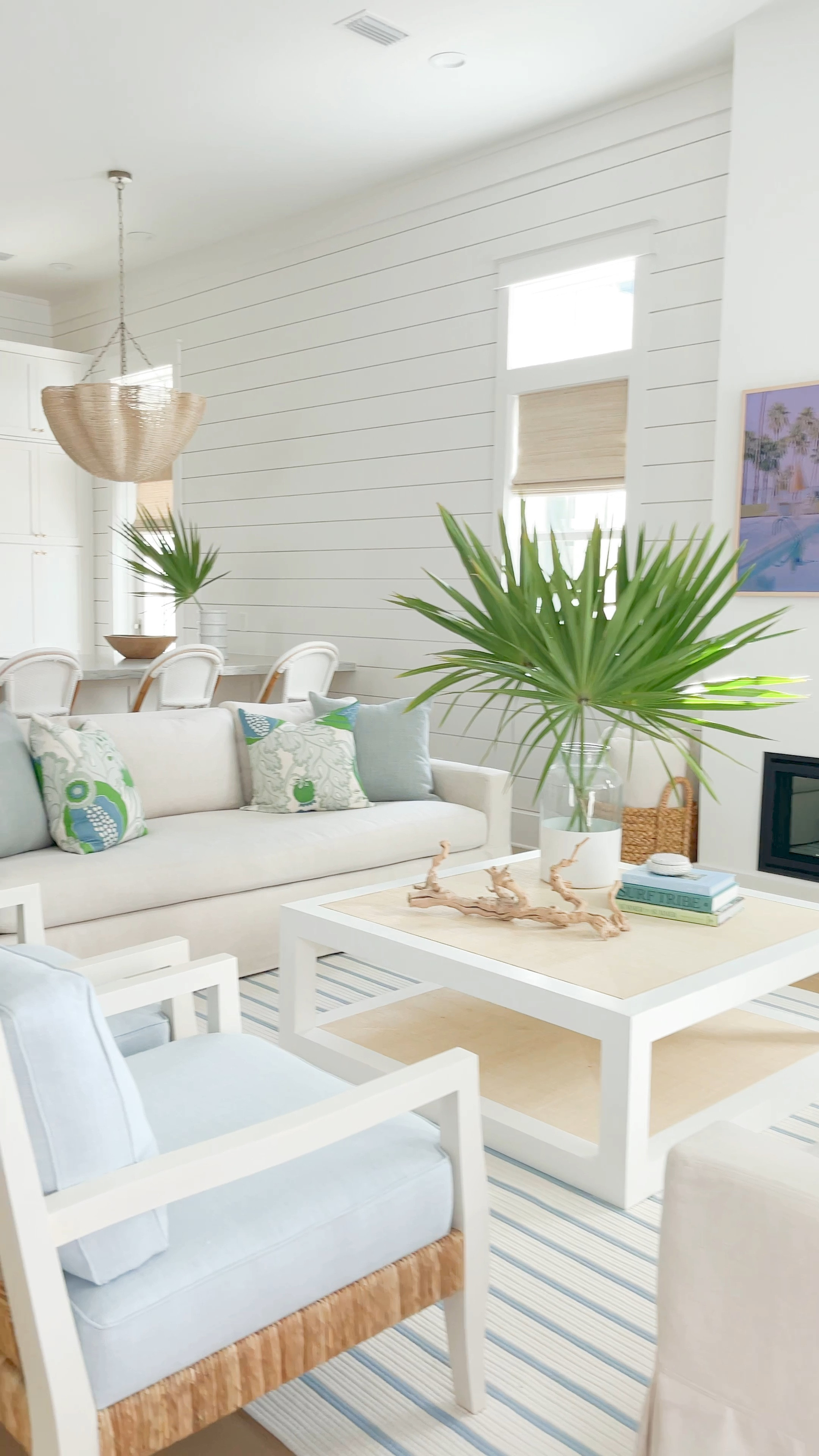 Sharing a mini tour of our new Florida home today! Includes items in our living room and kitchen like our linen sofas, woven back chairs, raffia coffee table, blue and white striped rug, blue and green throw pillows, rope chandeliers, swivel counter stools and so much more! See the full tour here: https://lifeonvirginiastreet.com/a-peek-at-our-new-florida-home/.
.
#ltkhome #ltkseasonal #ltksalealert #ltkvideo #ltkfindsunder50 #ltkfindsunder100 #ltkstyletip #ltkover40 #ltkfamily

#LTKhome #LTKVideo #LTKHoliday