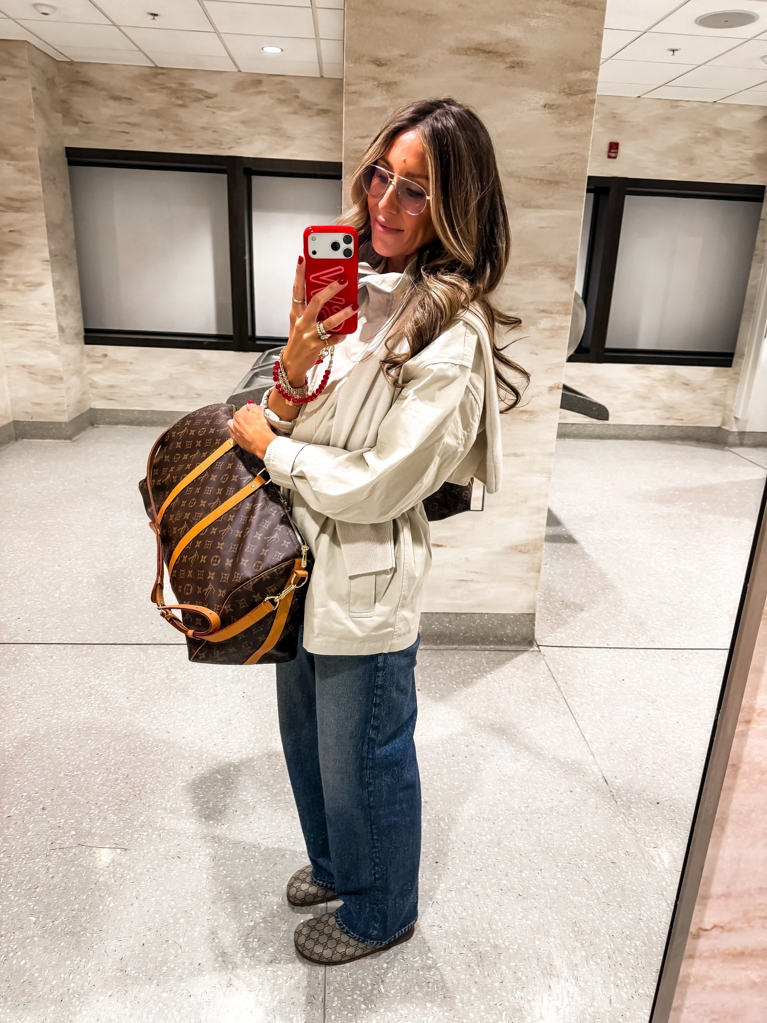 Travel outfit 
Gucci clogs runs TTS 
Trench size medium 
Viral sweatpant jeans size medium 

#LTKTravel #LTKOver40 #LTKmomlife