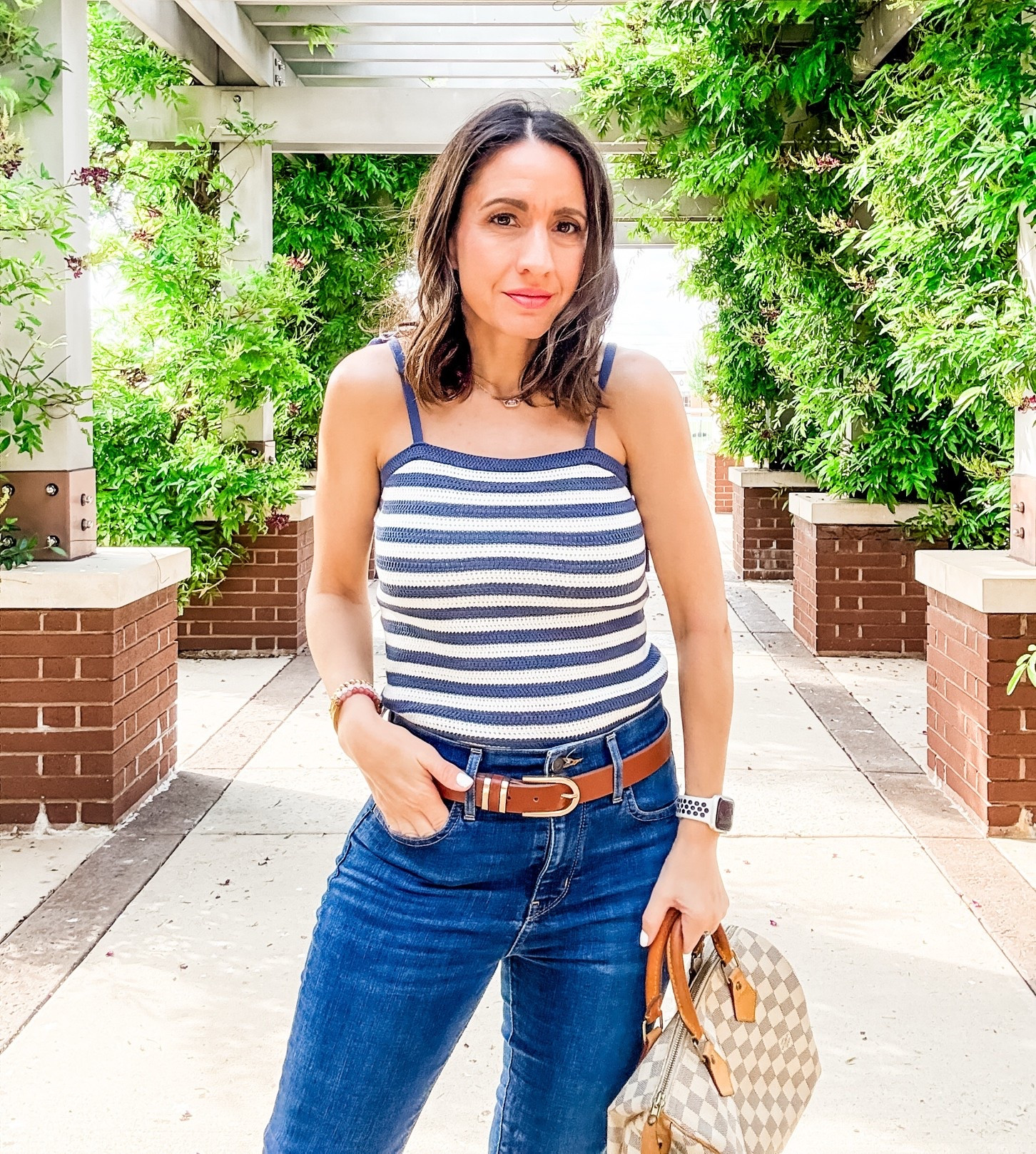 Blue and White tank top with tie straps. I love the lightweight material that feels lux. Runs big. Wearing an xsmall. 
Levi’s jeans are the 720 version and run true to size. 
Brown leather belt with gold detail. 
Petite style 
Petite outfit

#LTKOver40 #LTKPetite #LTKootd