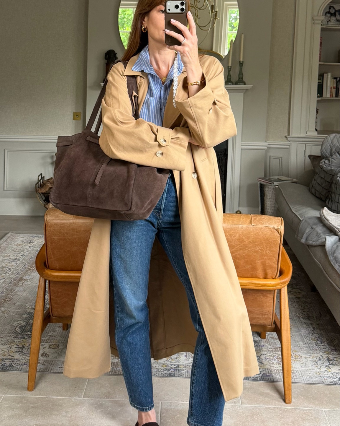 Striped shirt, Levi’s 501 crop, trench coat, suede loafers, suede bag

#LTKuk #LTKspring #LTKjeans