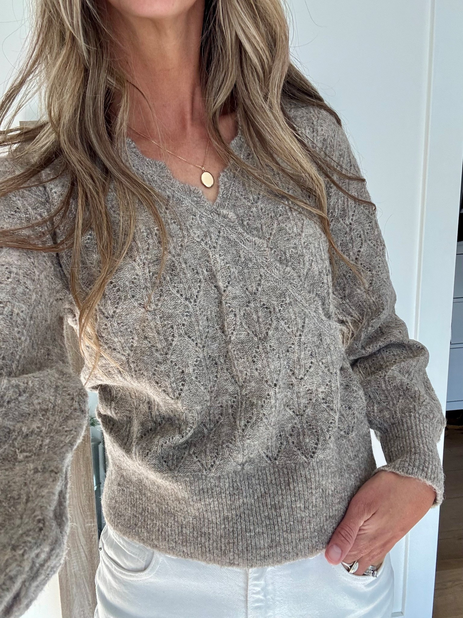 This sweater looks way more expensive than it is. Currently on sale for under $30. I’m 5’7.5” tall and I got an XS fits perfect!