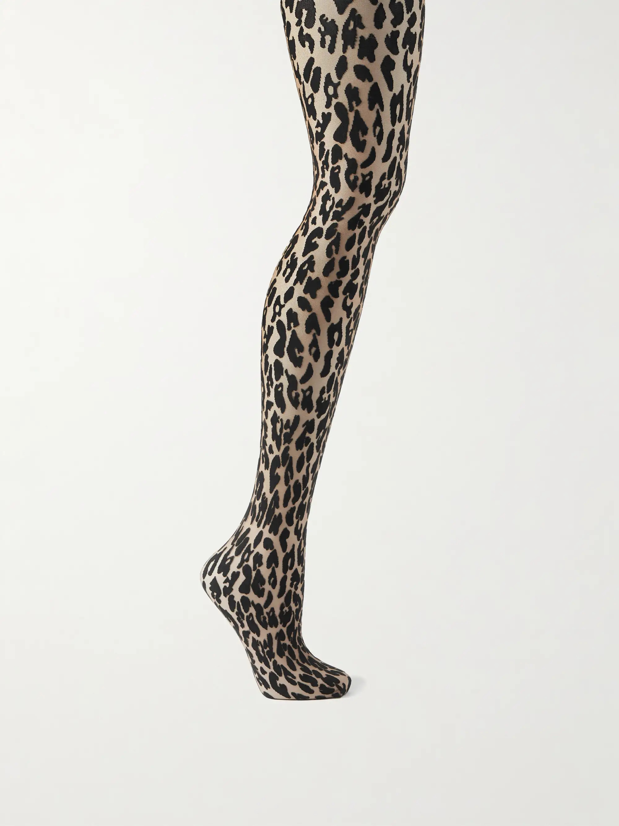 Wolford's 'Josey' tights are printed with playful leopard spots. The smooth, knitted waistband en... | NET-A-PORTER (US)