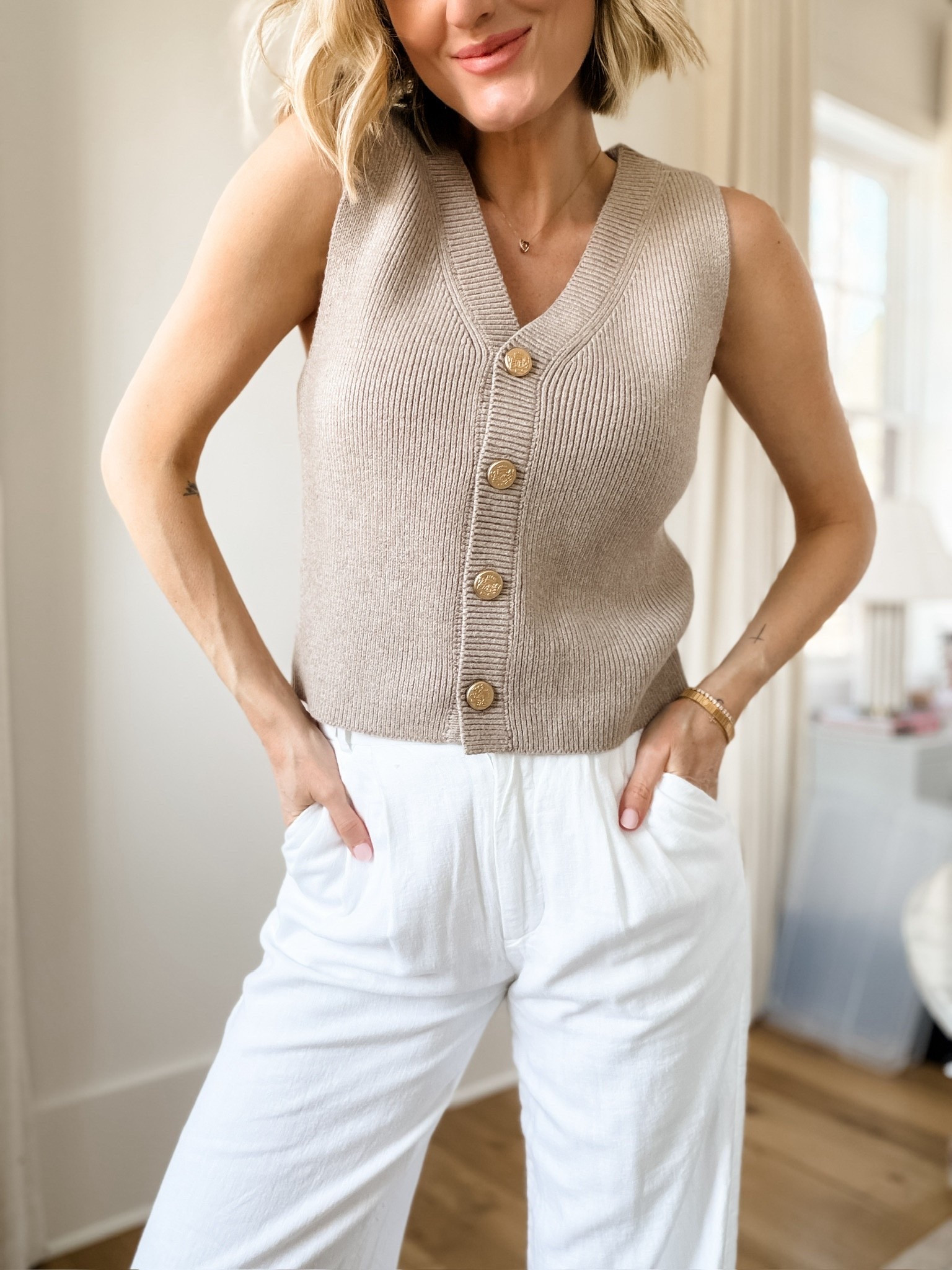 How cute is this neutral sweater vest?! So great for spring workwear! Wearing S/26.

Loverly Grey, Abercrombie, neutral sweater vest, white linen trousers, white linen pants, spring workwear, spring fashion, spring outfit ideas 

#LTKWorkwear #LTKootd #LTKSeasonal