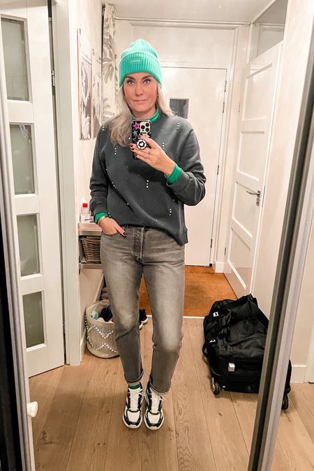 Ootd - Thursday. Ready to build a booth 👷🏼‍♀️. Wearing a green turtleneck base layer under a grey Zara sweatshirt paired with grey Levi’s 501 jeans, colorful socks and Skechers chunky sneakers. Green hat. 



#LTKmidsize #LTKeurope #LTKworkwear