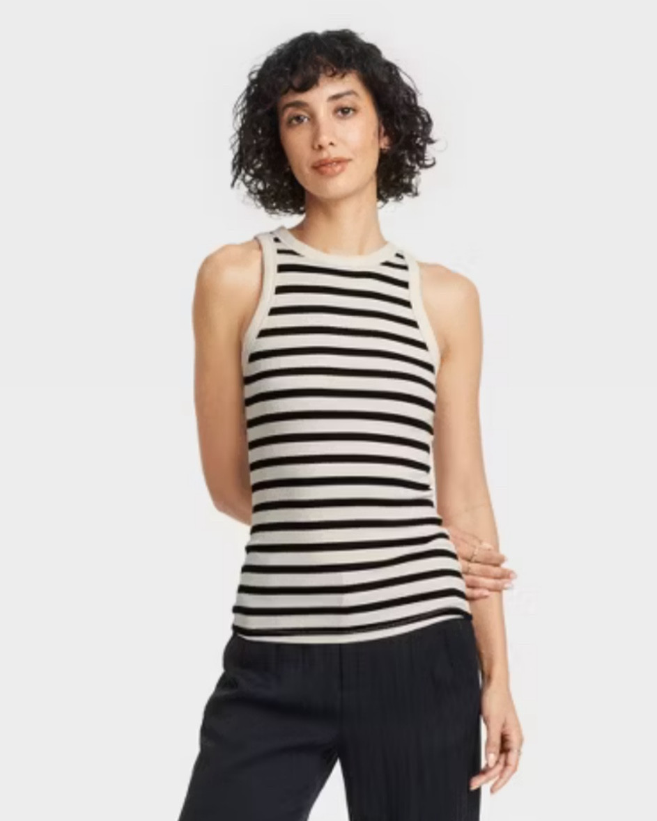 Love these simple, basic but so cute target tanks - I got a bunch of colors! They are going to be the perfect spring / summer staple  

#LTKMostLoved #LTKFindsUnder50 #LTKStyleTip