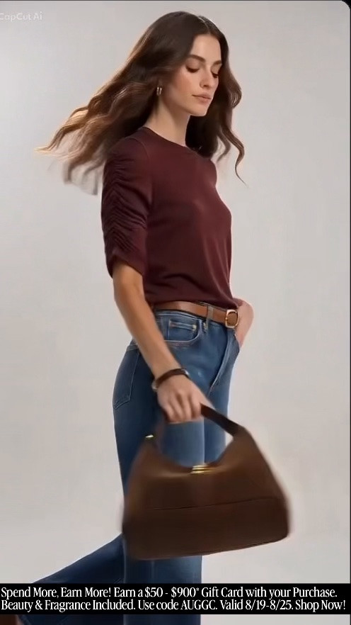 The perfect transitional outfit for late summer into fall 🤎 Rich burgundy, classic denim and chocolate brown accessories make this @Saks look feel effortlessly polished and incredibly wearable. Featuring a Veronica Beard ruched sleeve tee, FRAME jeans, Saint Laurent belt and suede shoulder bag, plus sleek patent heels. These are the elevated wardrobe staples you’ll reach for all season. #Saks #sakspartner