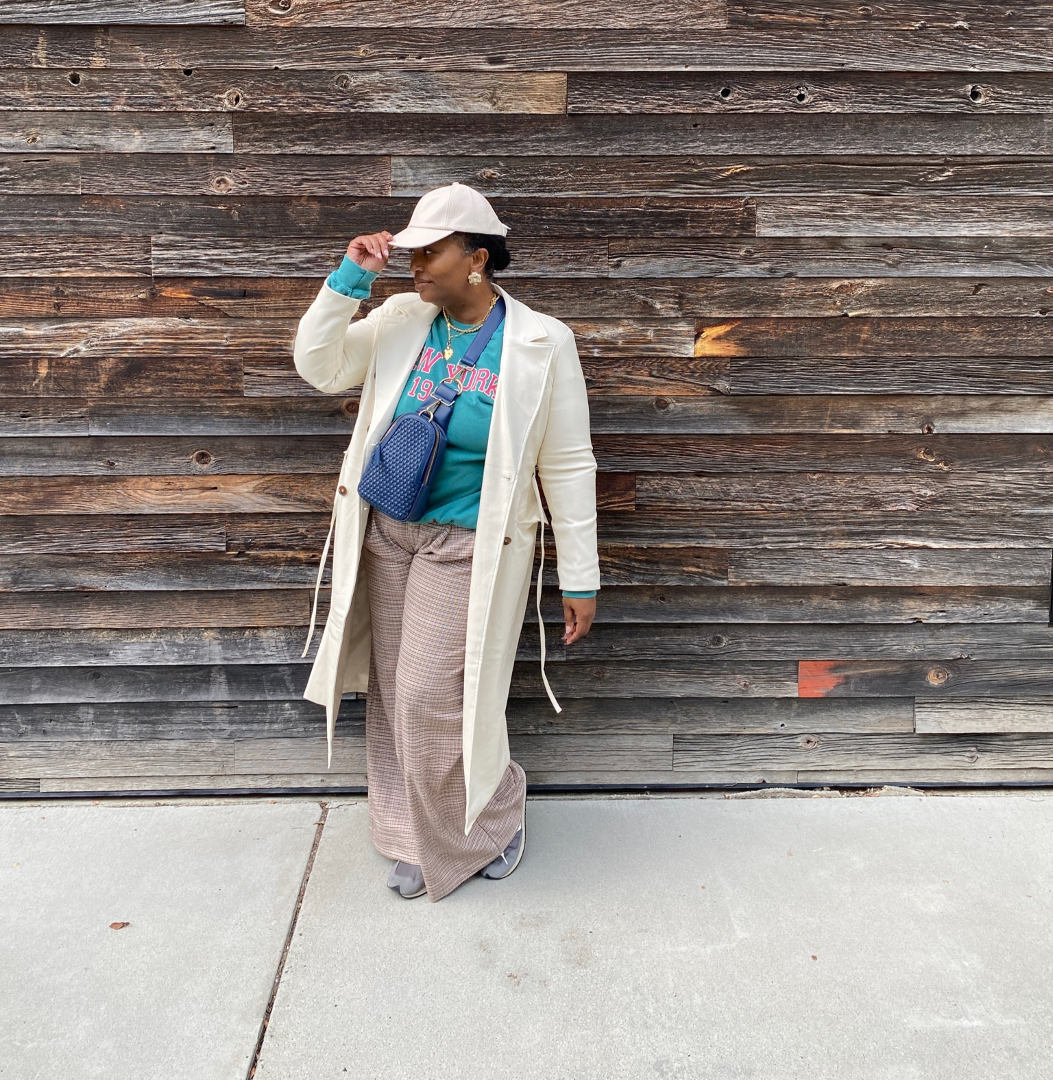 Your new casual Fall style inspo for running errands has arrived.  This faux leather trench is a must have it’s a quiet statement piece available in 3 colors. Grab a great baseball cap, your coziest sweatshirt. Ditch the denim for a fun and versatile wide leg pant & don’t forget your favorite sneakers! 

Instead of a tote bag, go hands free with the Liberty Woven Sling Crossbody.

Fit Details:
Trench: TTS
Sweatshirt: Runs oversized 
Pants: Size down; I’m wear a 12

#LTKover40 #LTKmidsize #LTKstyletip