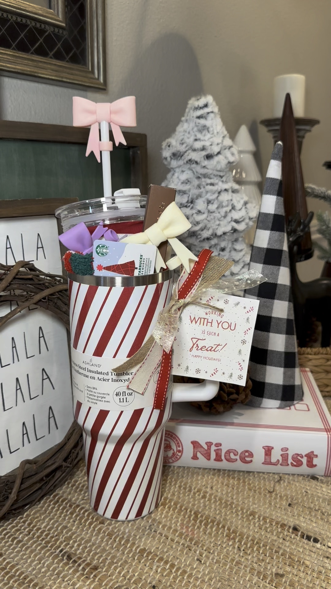 Christmas Gift Idea! A great gift for a co worker, friend, neighbor maybe your boss or client! So many fun reasons to gift this adorable tumbler. Shown in the picture is purple- just click the link & you can choose the striped one! Happy Gifting! 

#LTKSeasonal #LTKGiftGuide #LTKHoliday