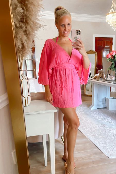 This pink swim cover-up is so cute! Love the quality and it's such a good price. The fabric has a gauzy airy linen feel. Comes in lots of colors! 

#LTKSeasonal #LTKstyletip #LTKswim