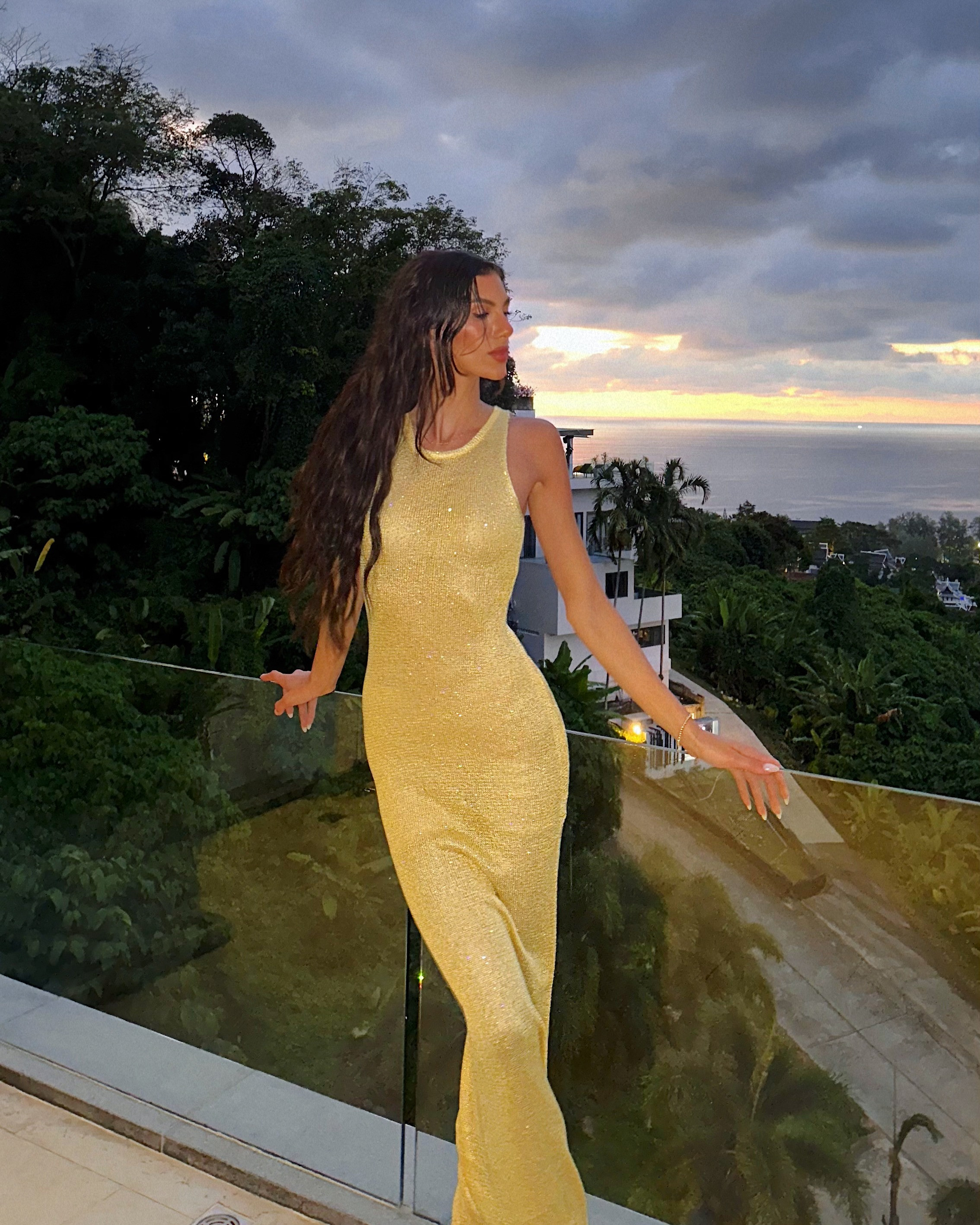 Golden hour glam in Thailand 🌴✨ This sparkly maxi from Asta Resort is vacation outfit goals—sleek, flattering, and shimmery? A whole moment. Perfect for a spring getaway or a standout date night dress, this one’s a must-save 💫 #VacationStyle #ResortWear 🌟 #EveningGlam #LTKSpring 💛 #GoldenHourGlow #LTKUnder100 #LTKFinds #LTKTravel #MaxiDressMagic

#LTKSeasonal #LTKParties #LTKWedding 

 