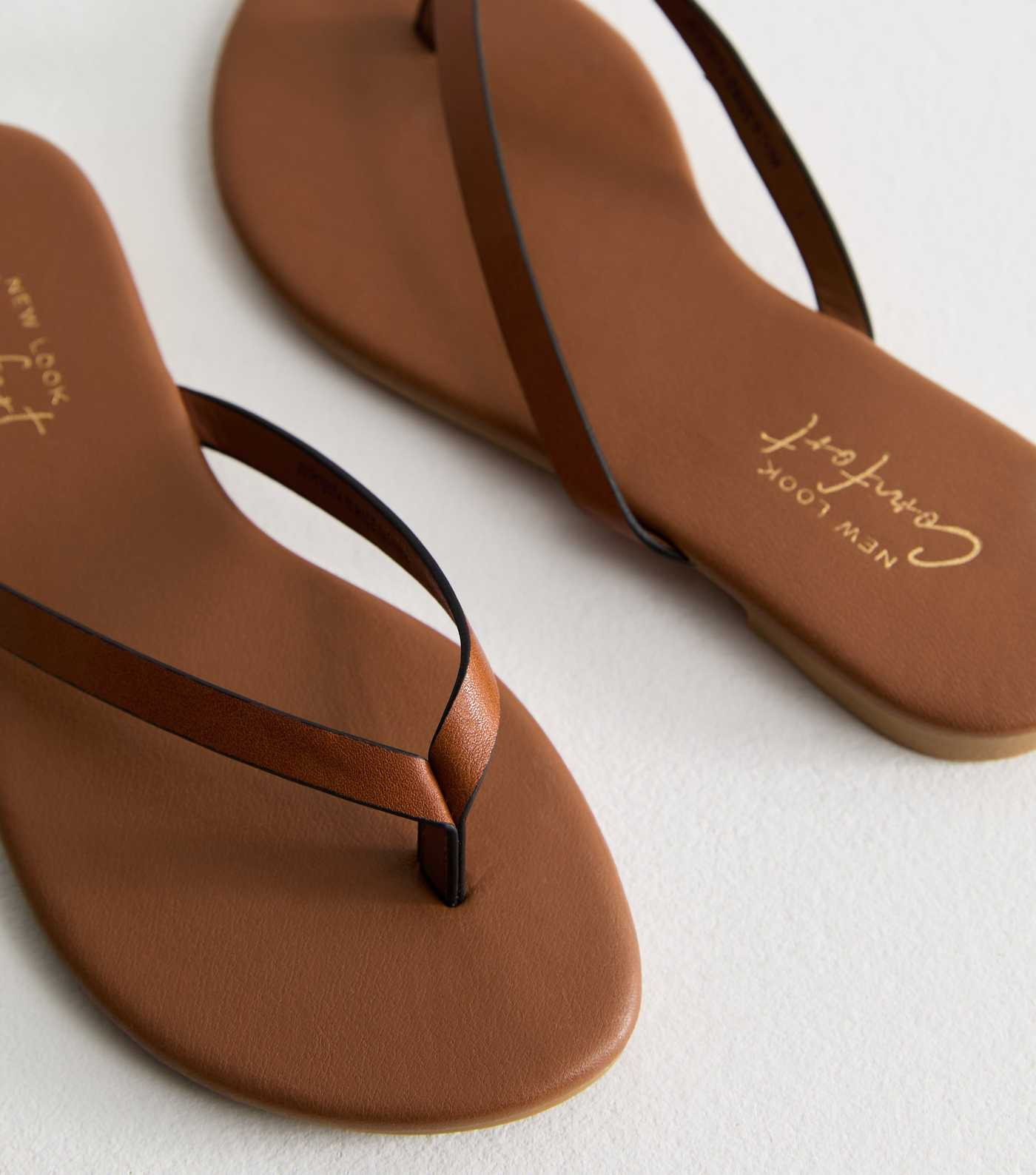 Tan Thong Strap Faux Leather Sandals
						
						Add to Saved Items
						Remove from Saved Item... | New Look (UK)