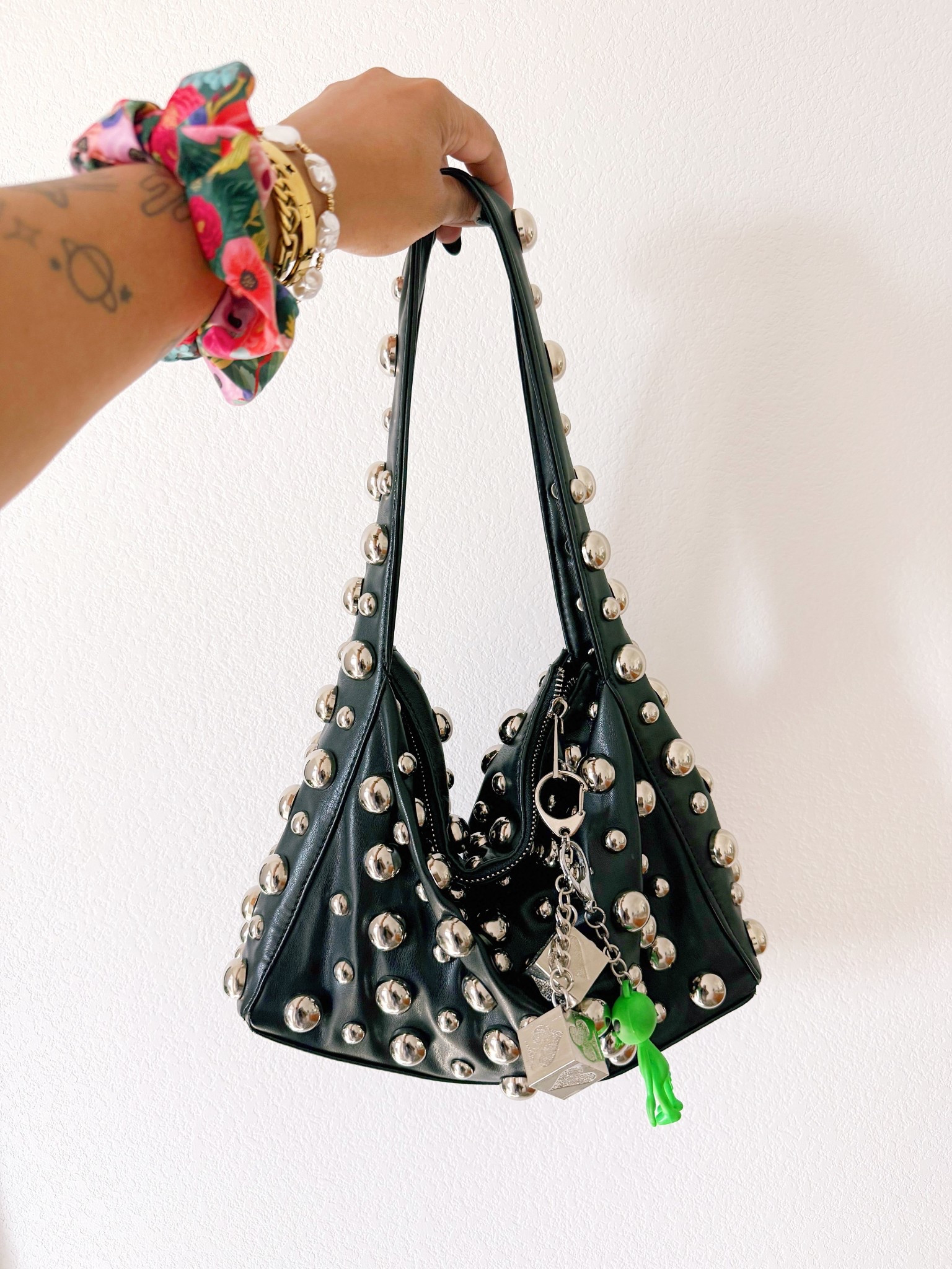 studded edgy handbag 👽
.
.
bag is linked, charms are not included 
#studded

#LTKStyleTip #LTKFindsUnder100 #LTKItBag