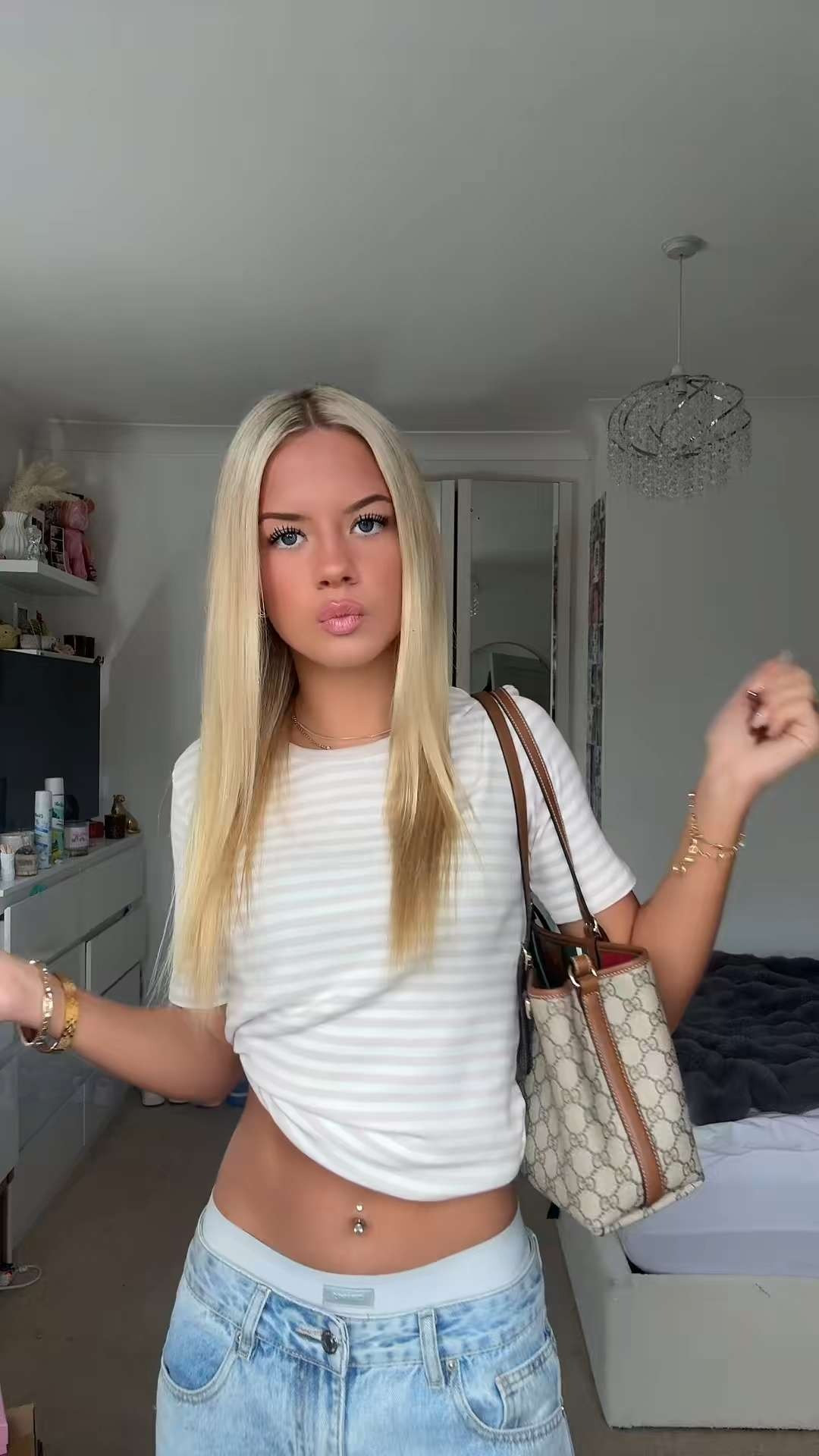 mini eggs and a gucci bag xx 

striped t shirt, plain t shirt, jeans and a t shirt, baggy jeans, low rise jeans, ripped jeans, brandy melville, gucci bag, designer bag, street style, casual, y2k 

 #LTKFashionMonth #LTKuk #LTKspring
