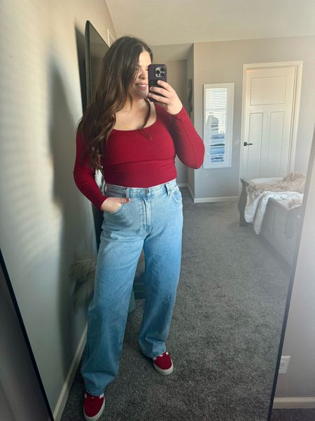 My casual Valentine’s Day outfit to go to Lanes preschool Valentines party! These jeans are the relaxed 90s denim from Abercrombie in a size 32 or size 14. I get long and I’m 5’ 7. 

Top is  Klassy network- it’s a bodysuit with a built-in bra and so comfortable in my boobs look so good!!! 

Shoes are my gazelle bold, do not size up in these they have lots of room   

Midsize Mom, midsize teacher, midsize casual, midsize, bodysuit, built-in bra date night 

#LTKmidsize #LTKfindsunder50 #LTKsalealert