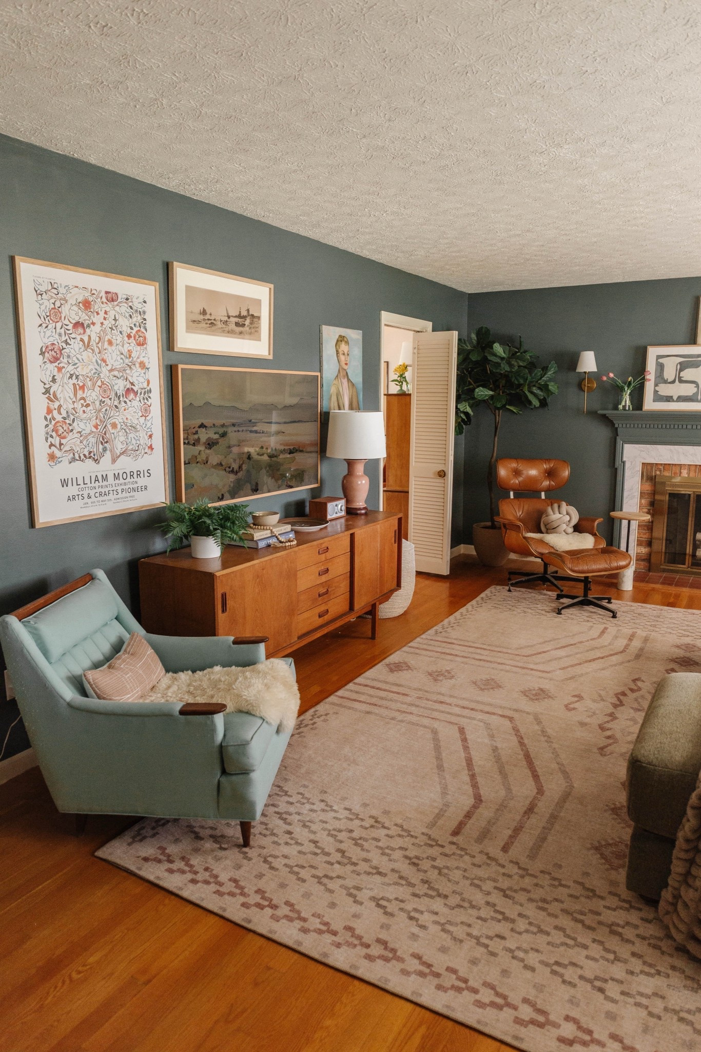Get the look of our living room with these modern mid-century home finds! Paint color: “Homburg Gray” from Sherwin-Williams ⭐️

#LTKFindsUnder50 #LTKFindsUnder100 #LTKHome