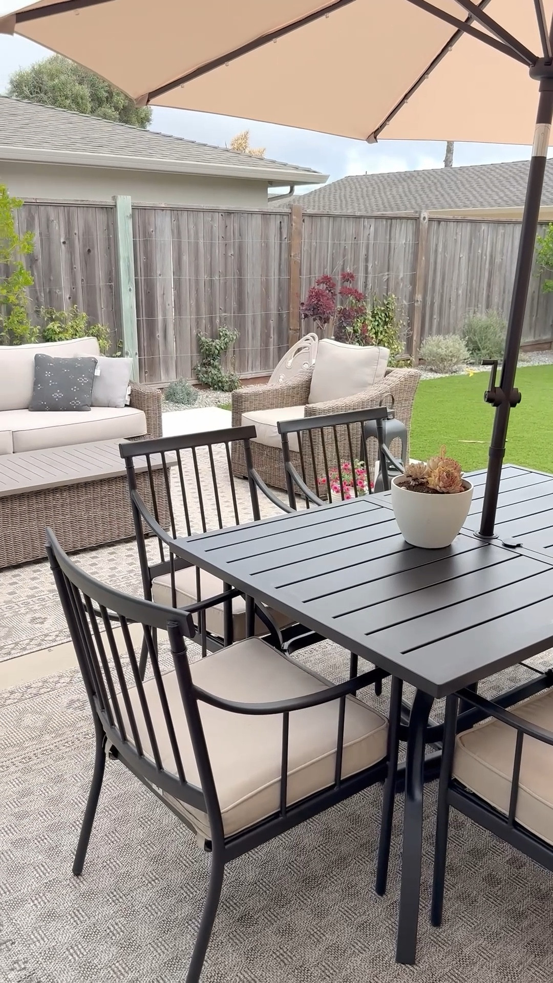 This outdoor dining set surprised me in the best way! I had my eye on a PB set and then came across this one. The chairs are so sturdy and the sloped arm detail is so pretty.  We added the umbrella for the sunny afternoons and at night the little lights turn on. 

With the hangout area and the dining area being so close, these matching rugs made the spaces go together but also feel a little separate. 

Follow along and share with a friend as we finish styling this area (adding/changing pillows, coffee table decor, & table setting). 

Everything is also linked on LtK. 

Patio Furniture | Outdoor Furniture | Patio Refresh | Patio Design | Home Decor | Home Styling | Transitional Style 
•
•
•
•

#outdoorfurniture #patiofurniture #outdoorliving homedecor #ltkhome

#LTKSaleAlert #LTKSeasonal #LTKHome