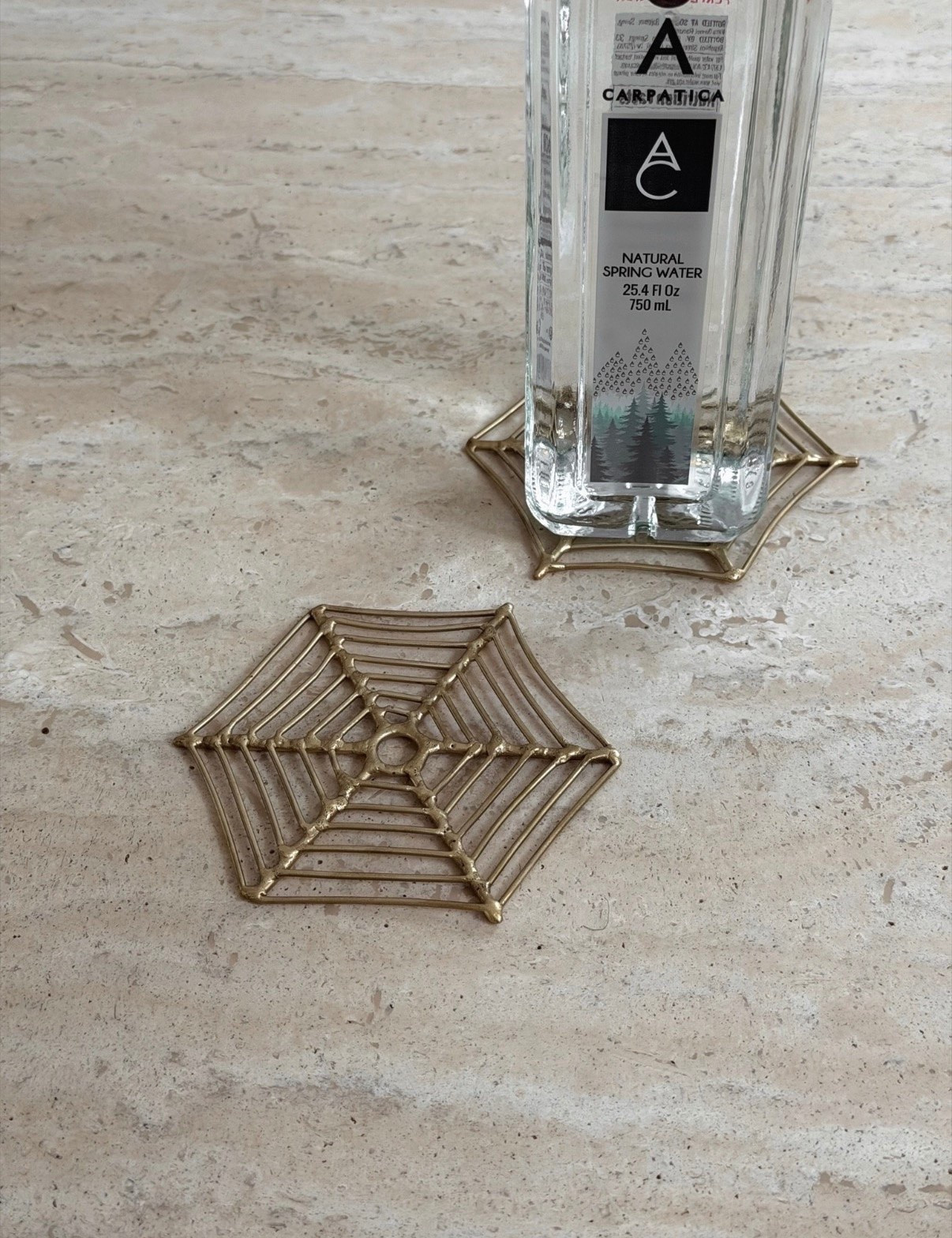 Anthropologie brass spiderweb coasters  

Anthropologie Halloween
Halloween decor

#LTKSeasonal #LTKHome