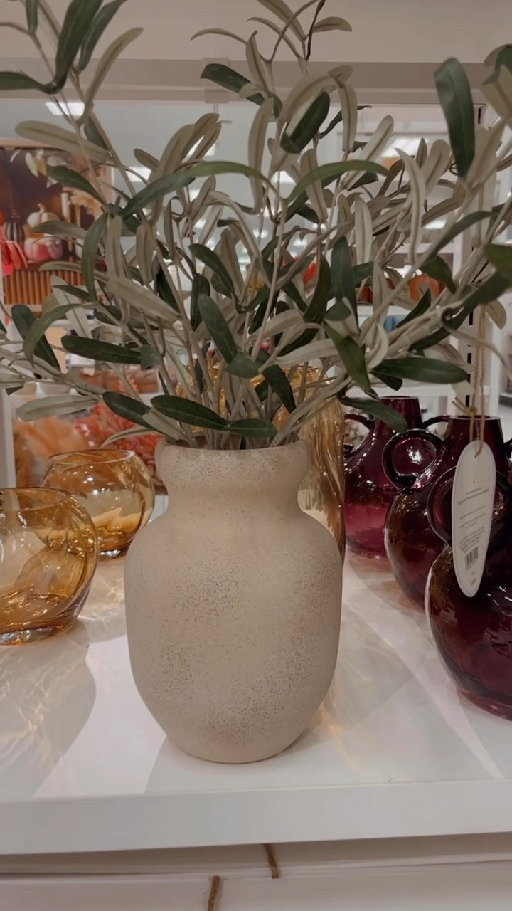 This olive leaf floral pot arrangement stopped me in my tracks! Absolutely gorgeous and I LOVE the size. Definitely an eye catcher 🤩 perfect on a fireplace mantel, kitchen island or entry way table.

#LTKHome #LTKVideo #LTKStyleTip