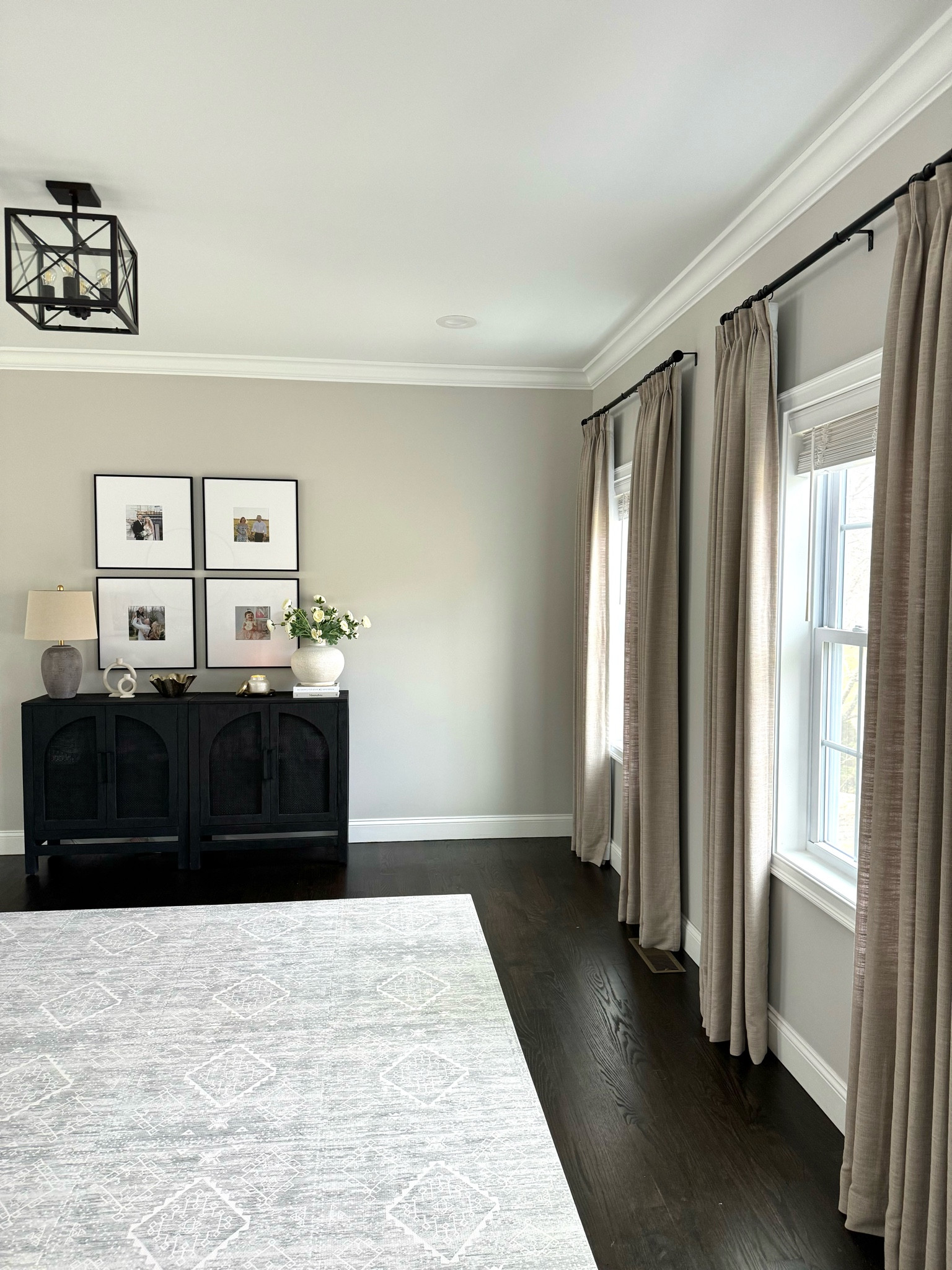 Still not over this room transformation with our custom curtains!

It took me a longgg time to decide on a color because they have so many great options to choose from. I’m so happy with my choice because these curtains bring so much more warmth to this side of our living room.  Our walls are a ”griege” but they look very different in certain lighting and depending on what furniture is in front of it. These curtains definitely helped bring out the beige undertones of the paint.

I think we need another set on the other side of this living room, behind our couches next!

My Curtain Details:
•Liz Linen
•Color: Burlywood Birch
•Triple Pleated
•Privacy lining
•Memory Training
  
Living room curtains, black console, cabinet, living room, living room with kids, mom life

#LTKhome #LTKfindsunder100 #LTKstyletip