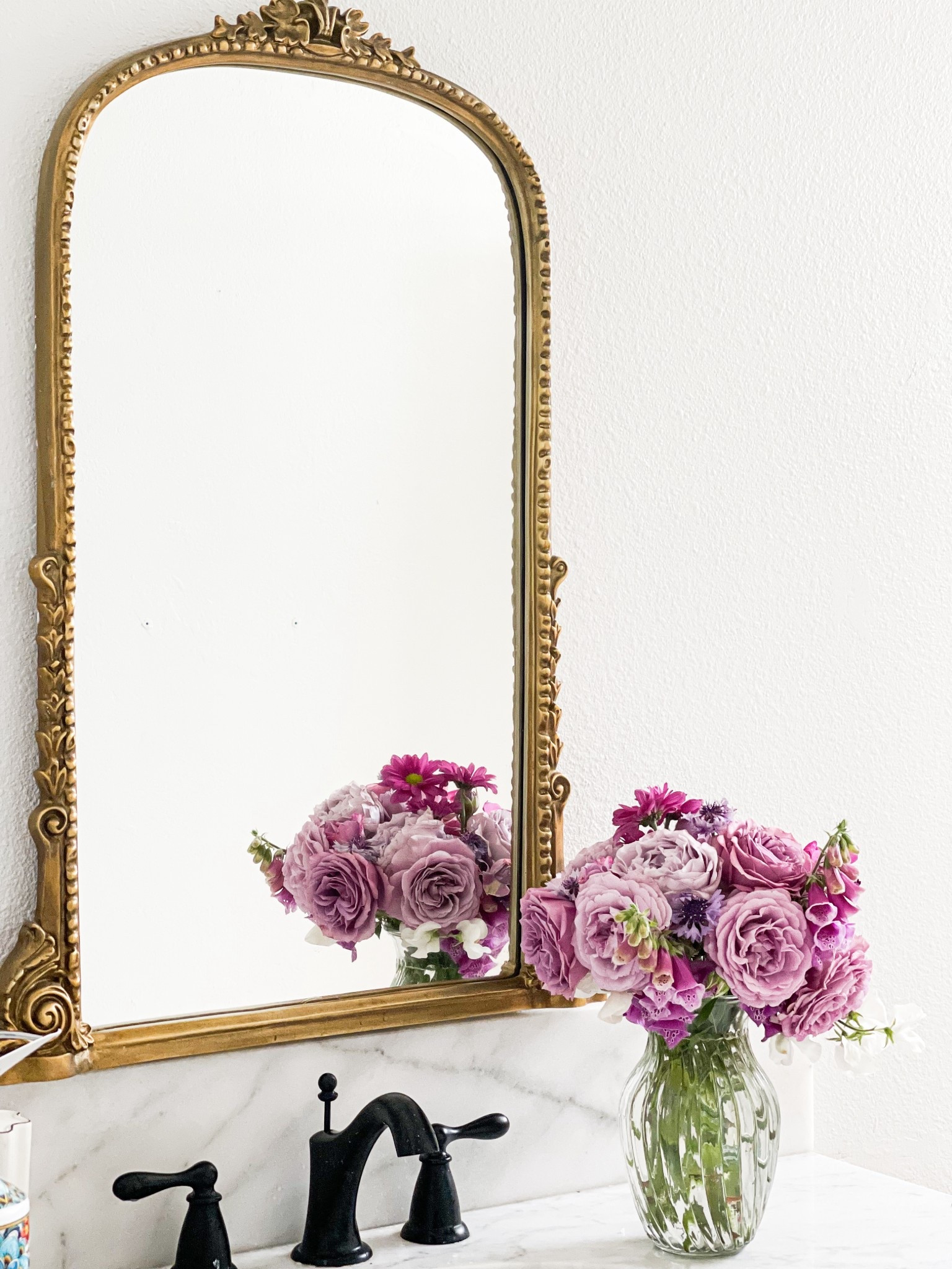 Obsessed with this gorgeous ornate mirror in my guest bathroom. My beautiful bathroom marble topped vanity is perfection! ❤️ 

#LTKSeasonal #LTKdayinmylife #LTKHome