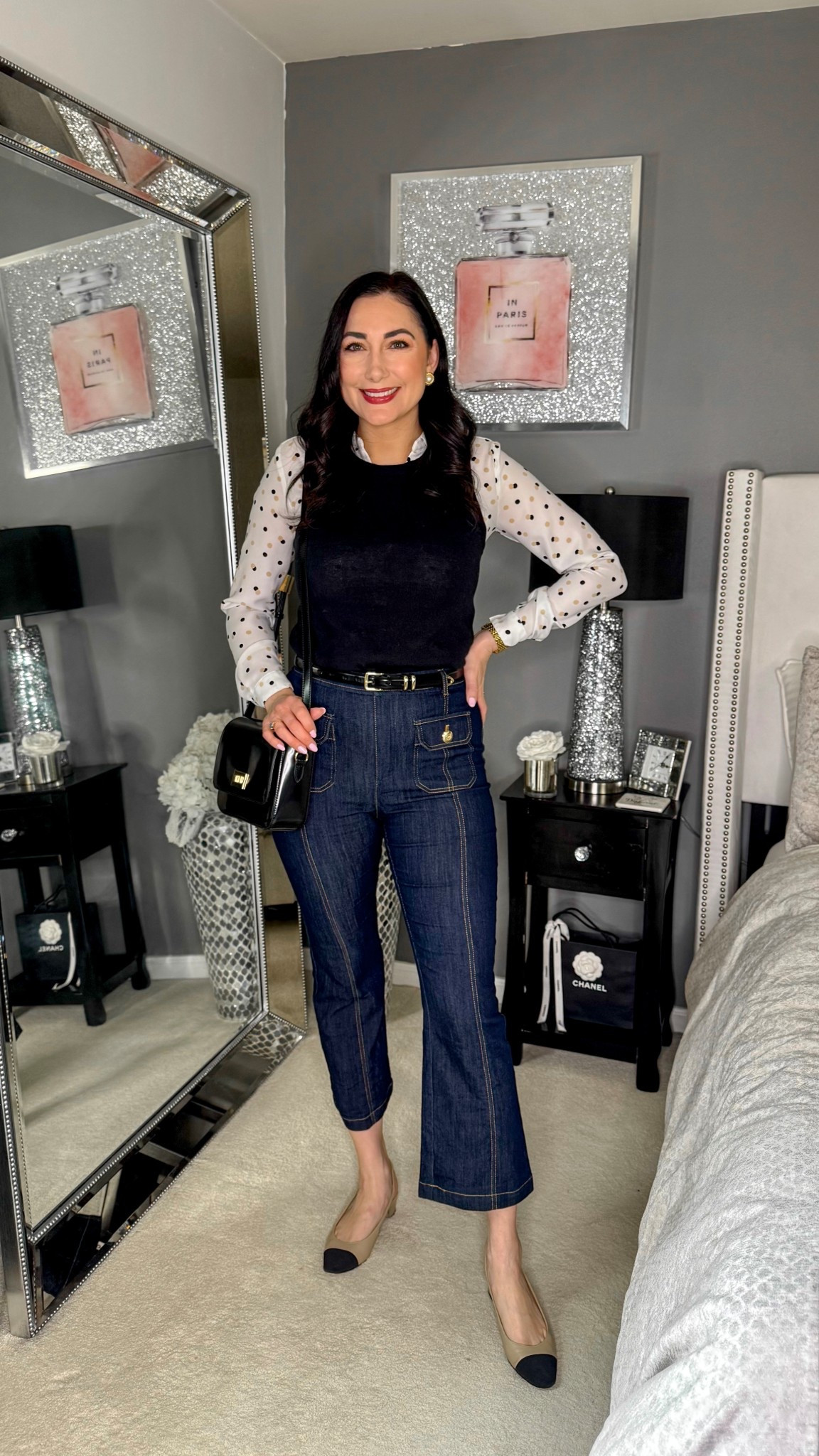 Smart casual outfit 🖤

Polka dot blouse 
Black sweater shell 
Dark kick flare jeans 
Cap toe sling backs 

Work wear 
Office outfit 
Work outfit 

#LTKSeasonal #LTKWorkwear