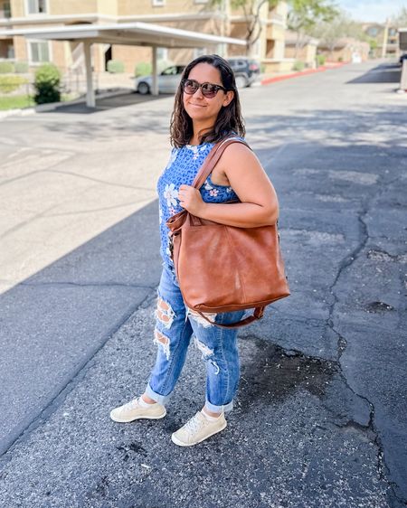 Casual spring outfit. This tank is long, more like a tunic - so I tucked it under for a shorter look. It comes in a ton of colors and patterns. Super comfy and flattering! Also, this faux leather tote is my favorite right now. I literally use it every day!

#LTKfindsunder100 #LTKstyletip #LTKfindsunder50