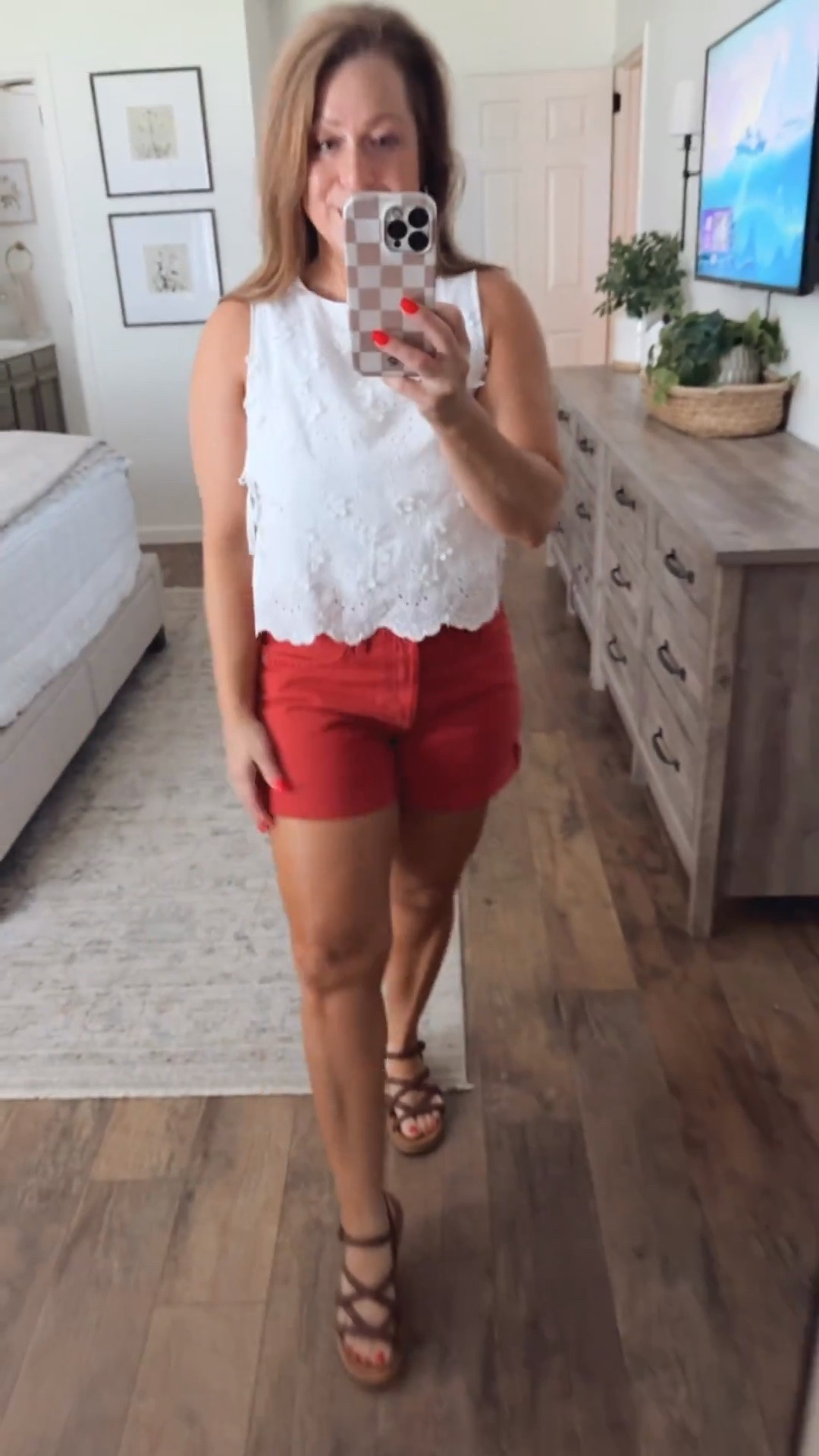 Summer outfit idea 
Eyelet top with side tie detail 
Denim shorts with cuffs and button fly
Sandals

#LTKootd #LTKPetite #LTKOver40