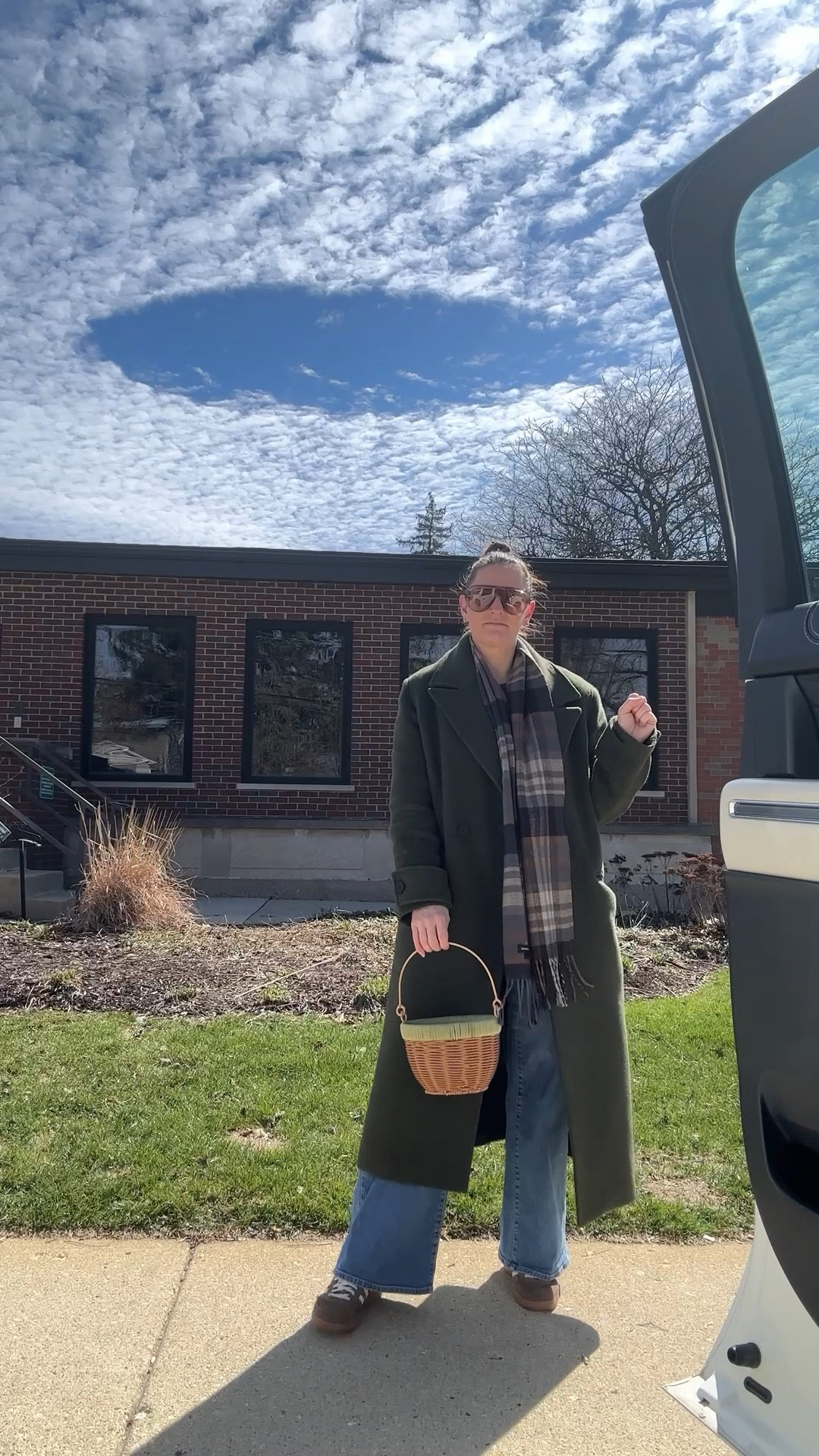 Spring Baskets 🧺 

It was a crisp spring day, which called for my wool jacket and scarf. A flower clip held my wrap bun with a bit of art. My Quay Sunnies protected my vision. 

A simple day fit for fun! 

#LTKSeasonal #LTKootd