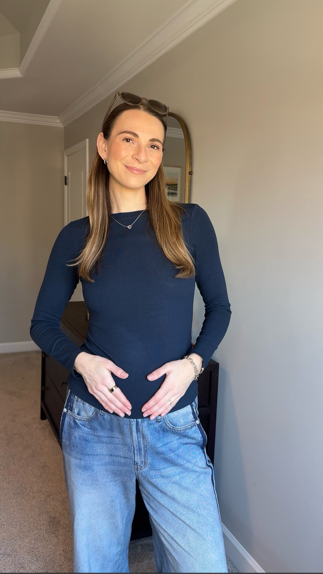 Bump OOTD

Long sleeve navy top - wearing size medium (sized up for bump). 
Sweatpant jeans - wearing size medium. TTS. 
Sneakers - tts. 

#LTKBump #LTKootd