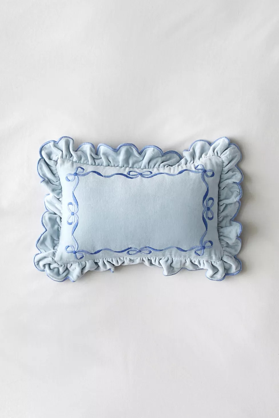 Lacey Bows Velvet Ruffle Bolster Pillow | Urban Outfitters (US and RoW)