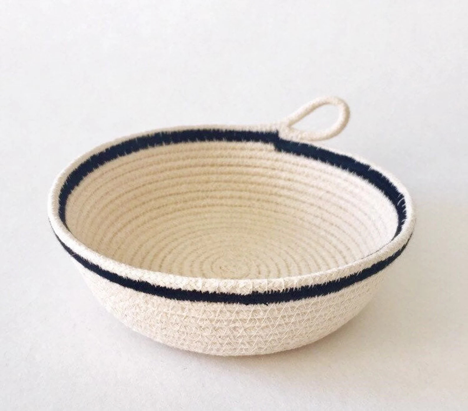 Handmade Small Natural Cotton Rope Basket, with dark navy stitching detail around the rim. | Etsy (US)