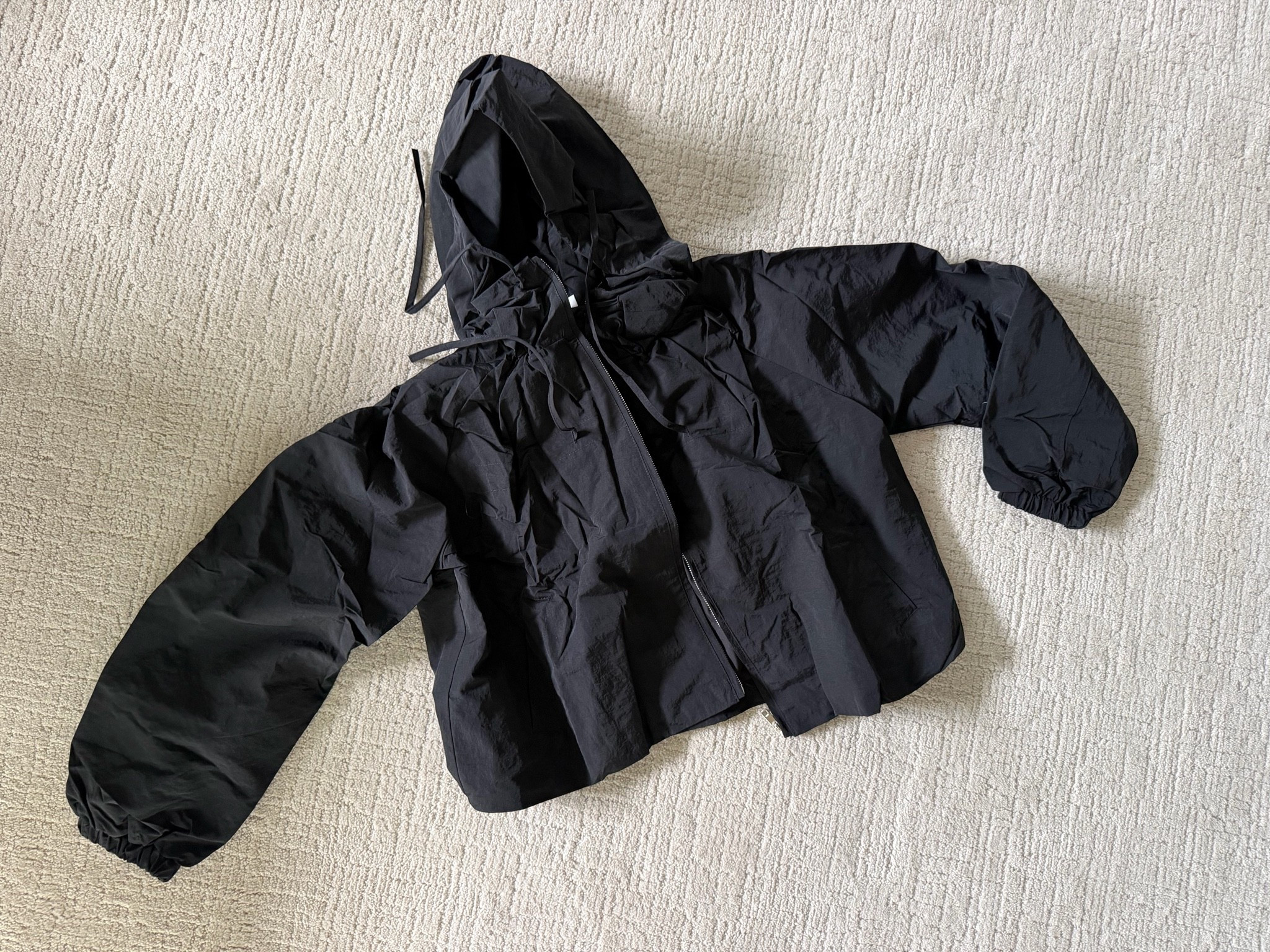 Cute black drawstring, lightweight jacket for sidelines, game days, and tournament weekends, Amazon finds for sports moms