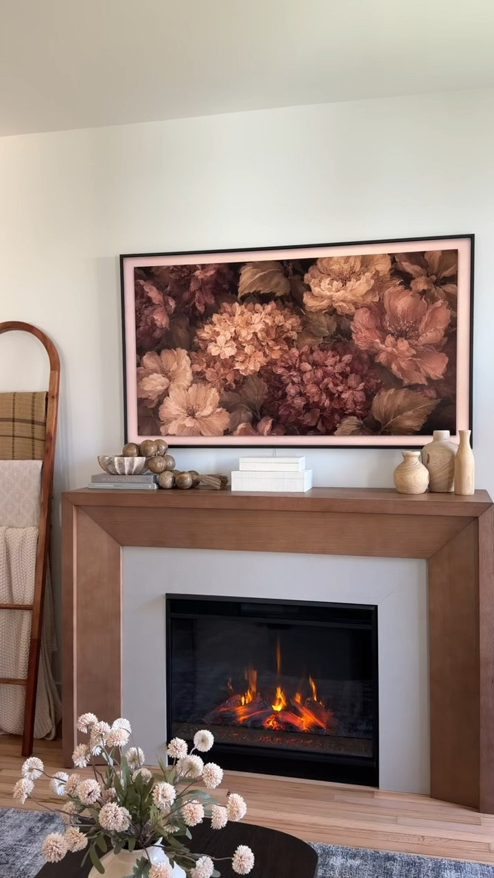 Look at this real flame 64” grand electric fireplace with mantle for our Airbnb living space — we LOVE the quality of this beautiful piece! 

#Airbnbhome
#modernhome
#falldecor