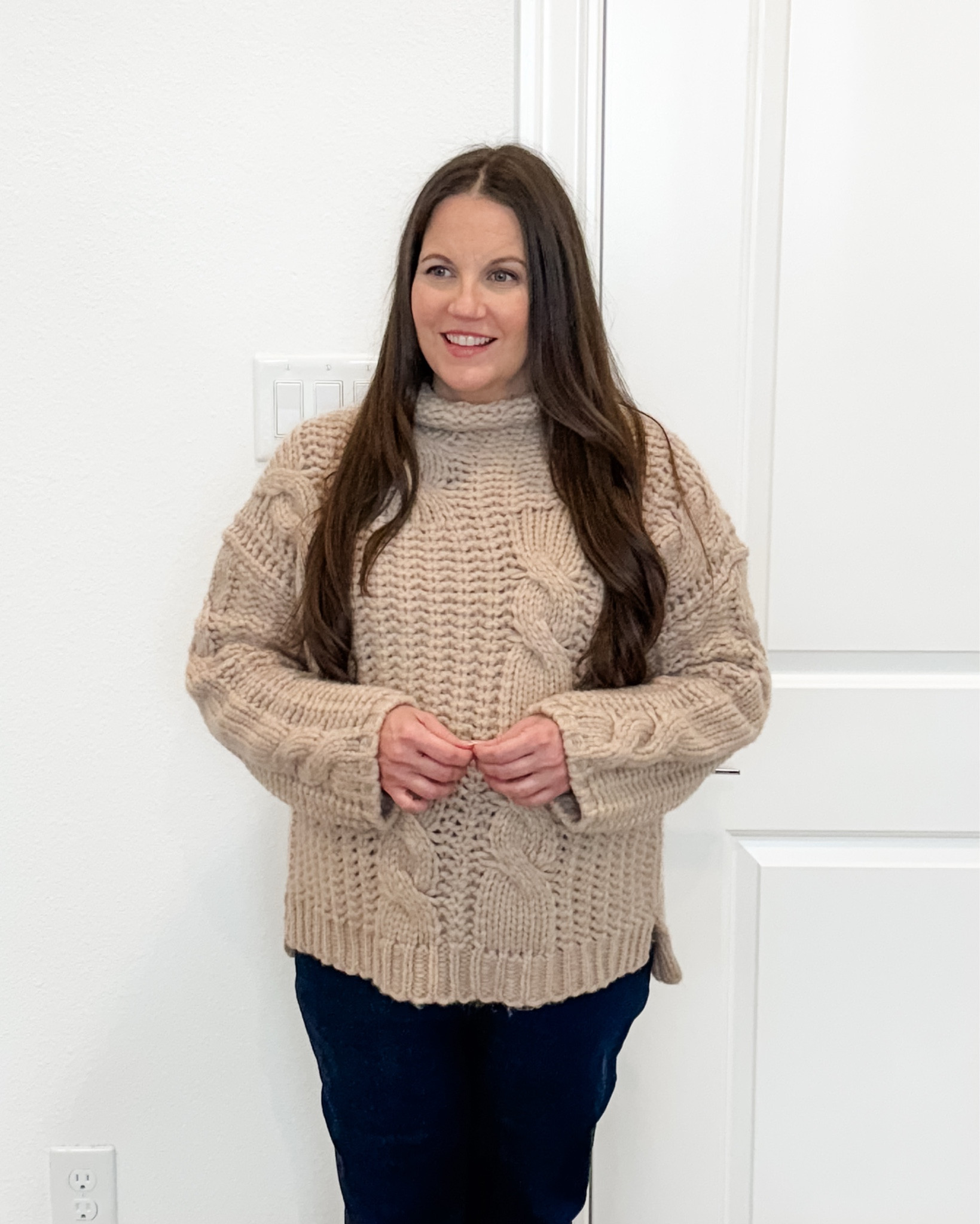 Polished Winter Pregnancy Outfit

If you love elevated basics, this winter outfit is such a good one. The mock-neck cable wool blend sweater paired with dark blue bootcut flared jeans creates a flattering, bump-friendly silhouette. Easily the best maternity jeans I’ve worn.
Finished with tan boots or light brown booties, this maternity outfit works for so many occasions and is a great dressy casual outfit option for anyone searching for chic winter outfits women can wear during pregnancy.

#LTKOver40 #LTKPetite #LTKSeasonal