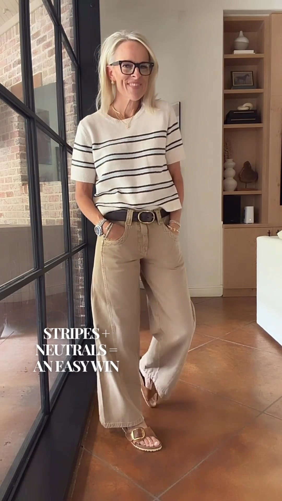 Stripes + neutrals are one of those combinations that always work. I love how this striped knit adds just enough interest to a simple pair of wide-leg pants, while the belt and neutral accessories keep the whole look polished and easy.

The sandals I’m wearing here are low in stock, so I’m linking another shoes that I think works beautifully with this outfit as an alternative.