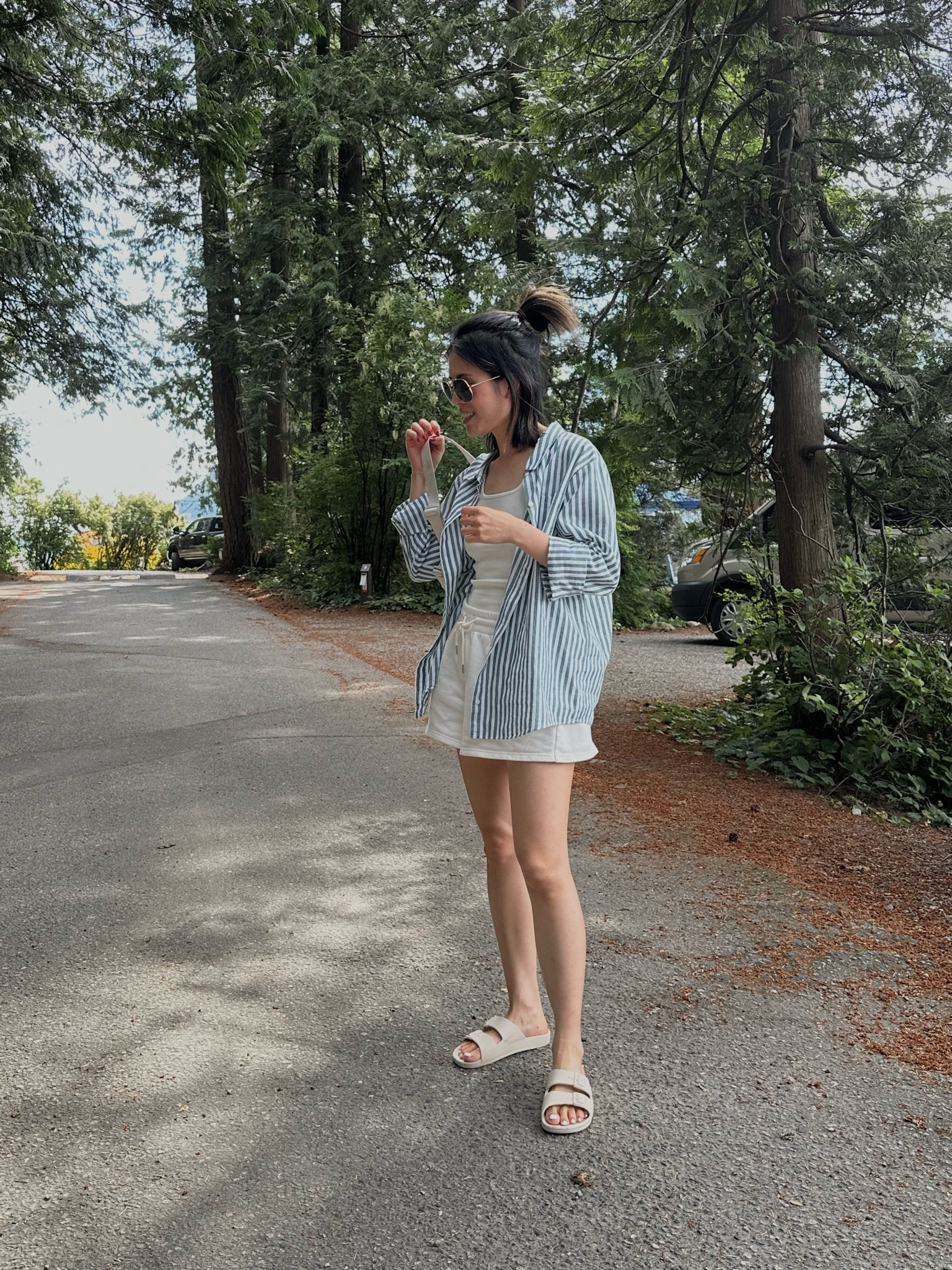 Shirt: Sezane Tomboy. Sized wayyy up to size 12. 
Tank: Kotn. Highly recommended. Tts
Shorts: old. Linked similar 
Freedom Moses slides. I’m size 7 and 6/7 fits greatt

#LTKcanada #LTKshoes #LTKsummer