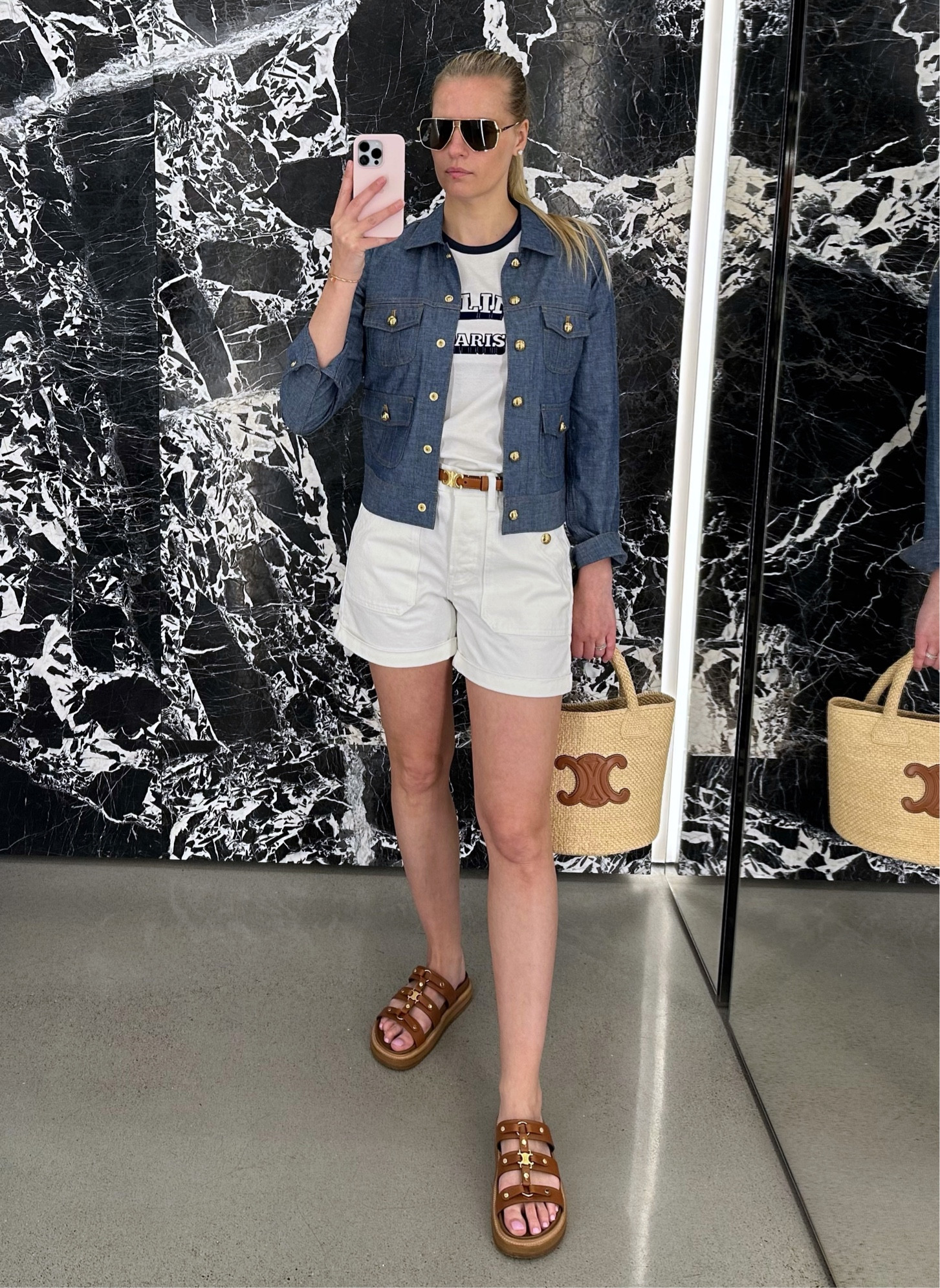 Perfect CELINE outfit for a boating day! 4th of July ready
•Trucker jacket
•Celine Paris 80’s t-shirt
•Suzanne denim shorts
•Medium coated canvas Triomphe belt with calfskin border
•Small Triomphe Panier bag in raffia and calfskin 
•Tippi slide sandals 
#ootd #celine #celinebyhedislimane #summeroutfit #celineoutfit #boatingoutfit #celinesunglasses #celineshoes #celinebag #celinebelt

#LTKstyletip #LTKFind #LTKSeasonal