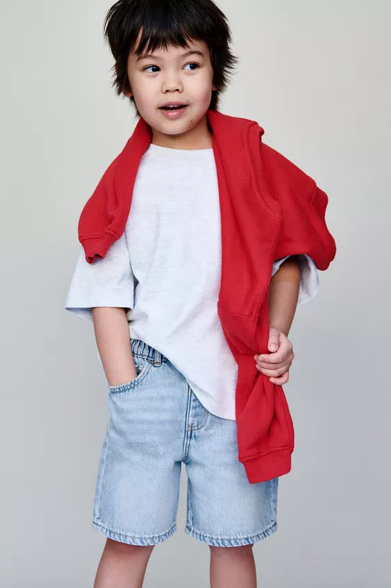 Baggy denim shorts with elastic waistband and front snap button closure. Front pockets and back p... | Zara US
