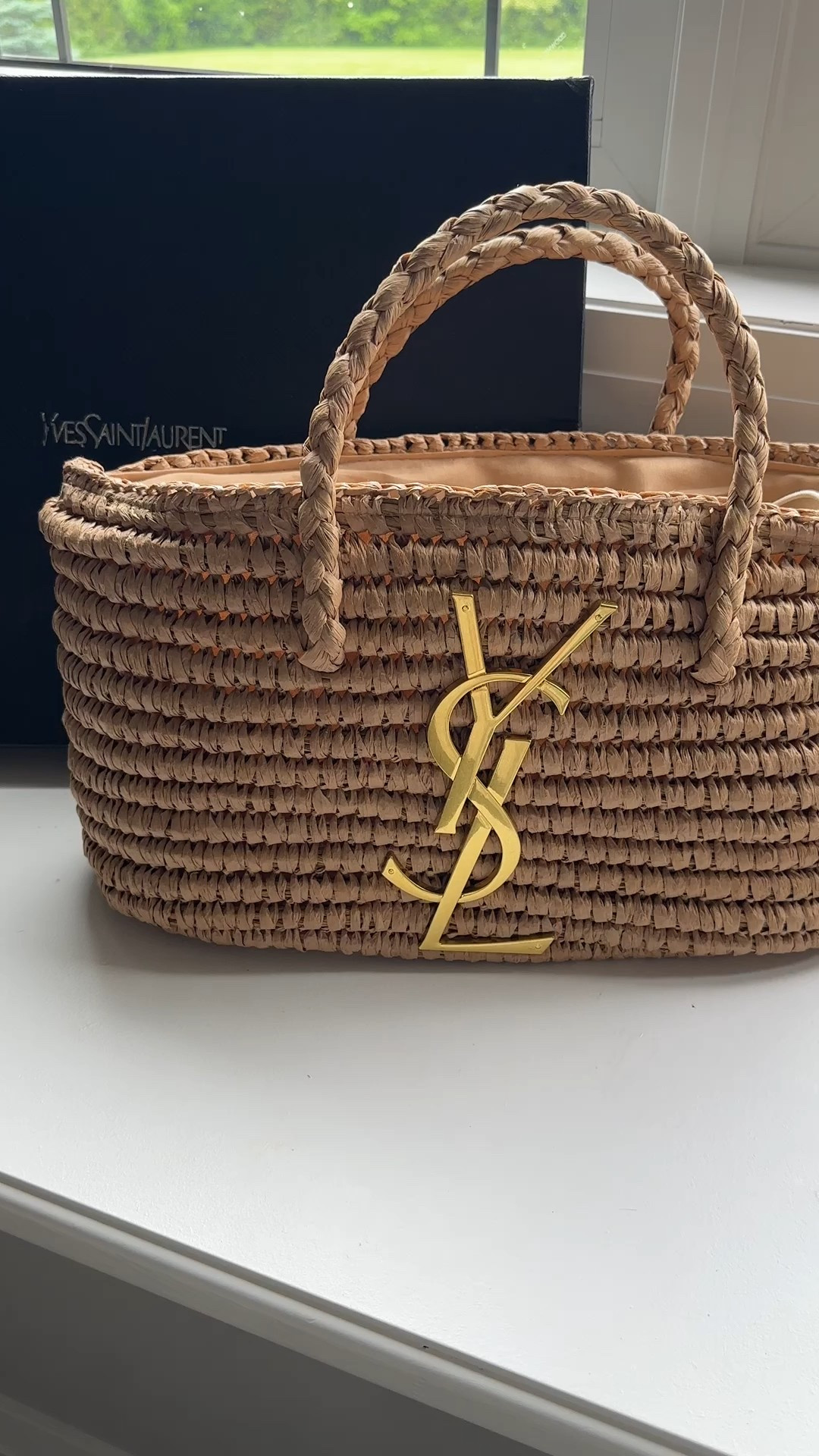 YSL Wicker beach bag. Came a little deformed because they had to flatten it to get in the box but I was able to reshape it with books inside. Super cute for summer. Comes with tons of different options. 

#LTKstyletip #LTKbag #LTKsummer