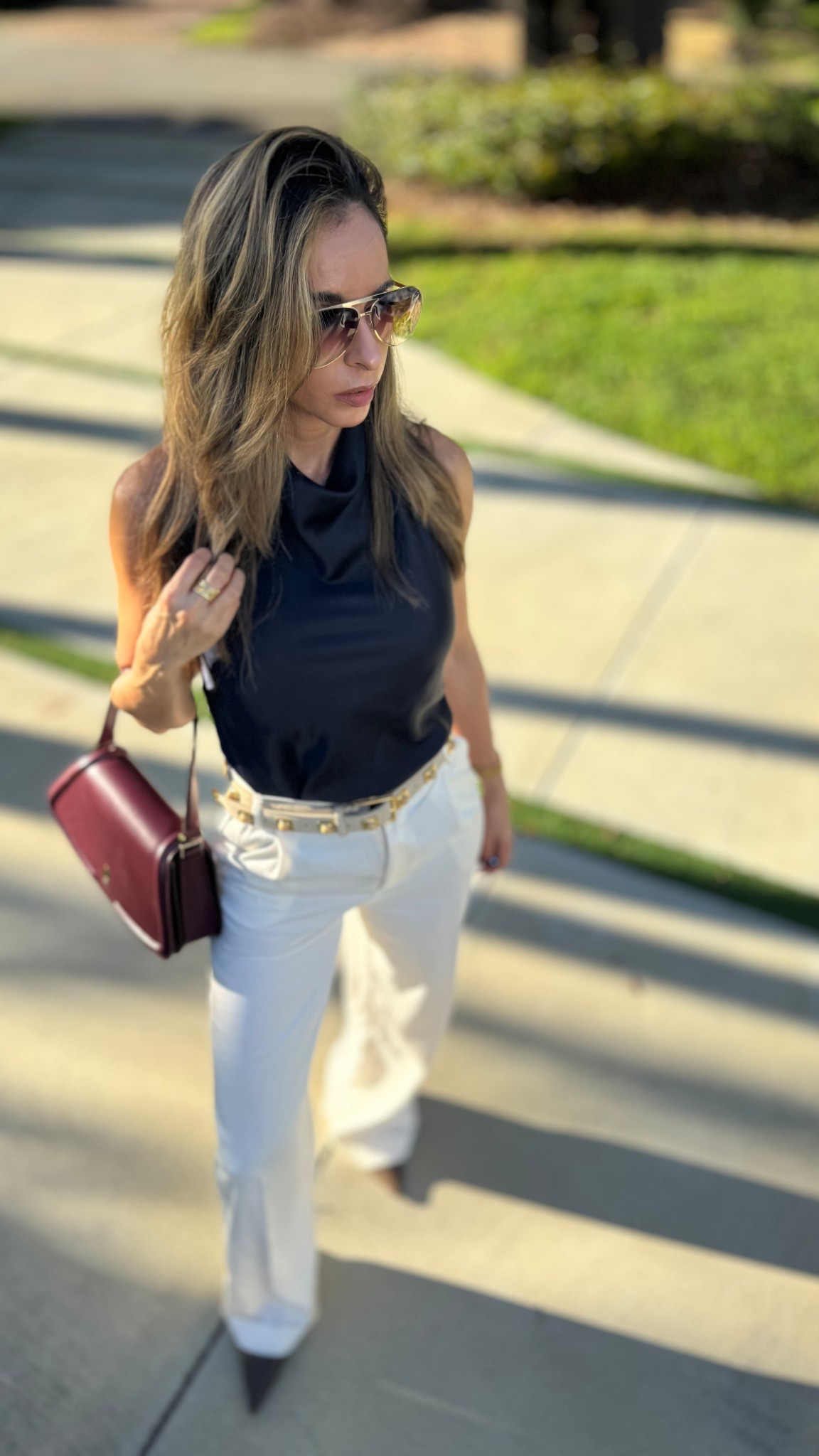 Classic and timeless — tailored trousers with a sleek navy halter top. Finished with a slim belt, kitten heels, and a structured burgundy bag for that rich-girl vibe.


#LTKSeasonal #LTKParties #LTKStyleTip