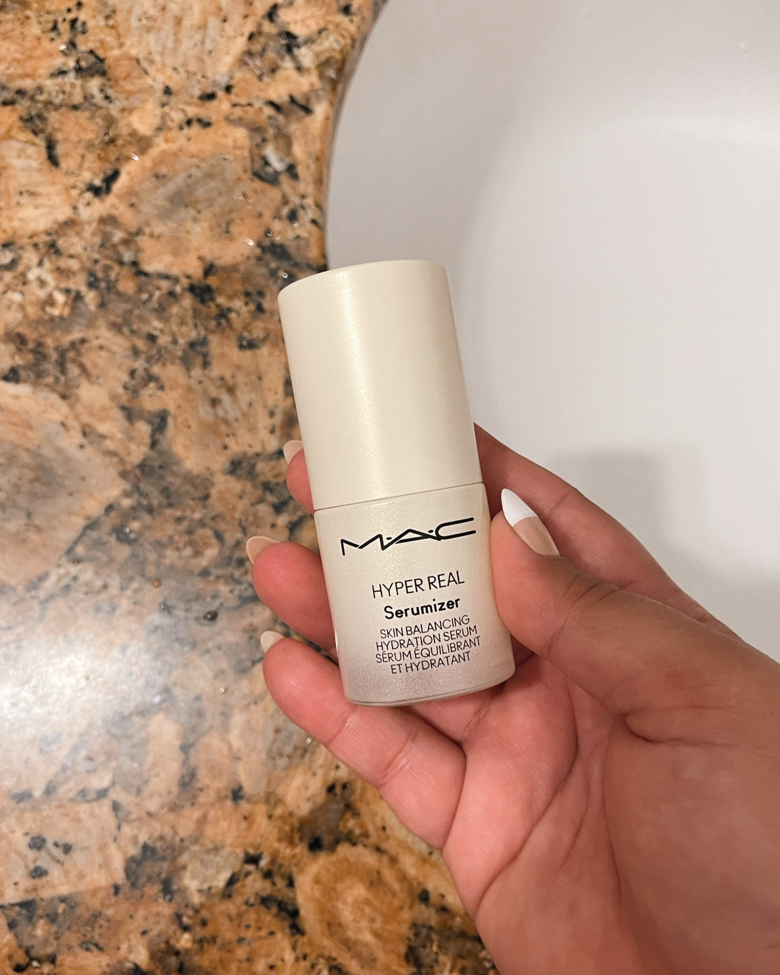 I just applied this MAC Hyper Real Serumizer to my skin before makeup, and my skin looks and feels so smooth even though I have texture from acne scarring right now. Like, what is this sorcery? I love it!

#LTKfindsunder100 #LTKbeauty #LTKfindsunder50