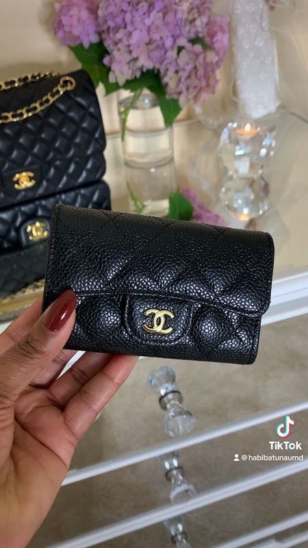 Chanel classic flap wallet / card holder  ❤️The perfect size for all your bags. 
I bought mine at the Chanel boutique in Charlotte NC in black caviar gold hardware. 
Available also from the pre-loved market. Here are some examples and also other Chanel wallets I love. 

#LTKitbag #LTKFind #LTKstyletip